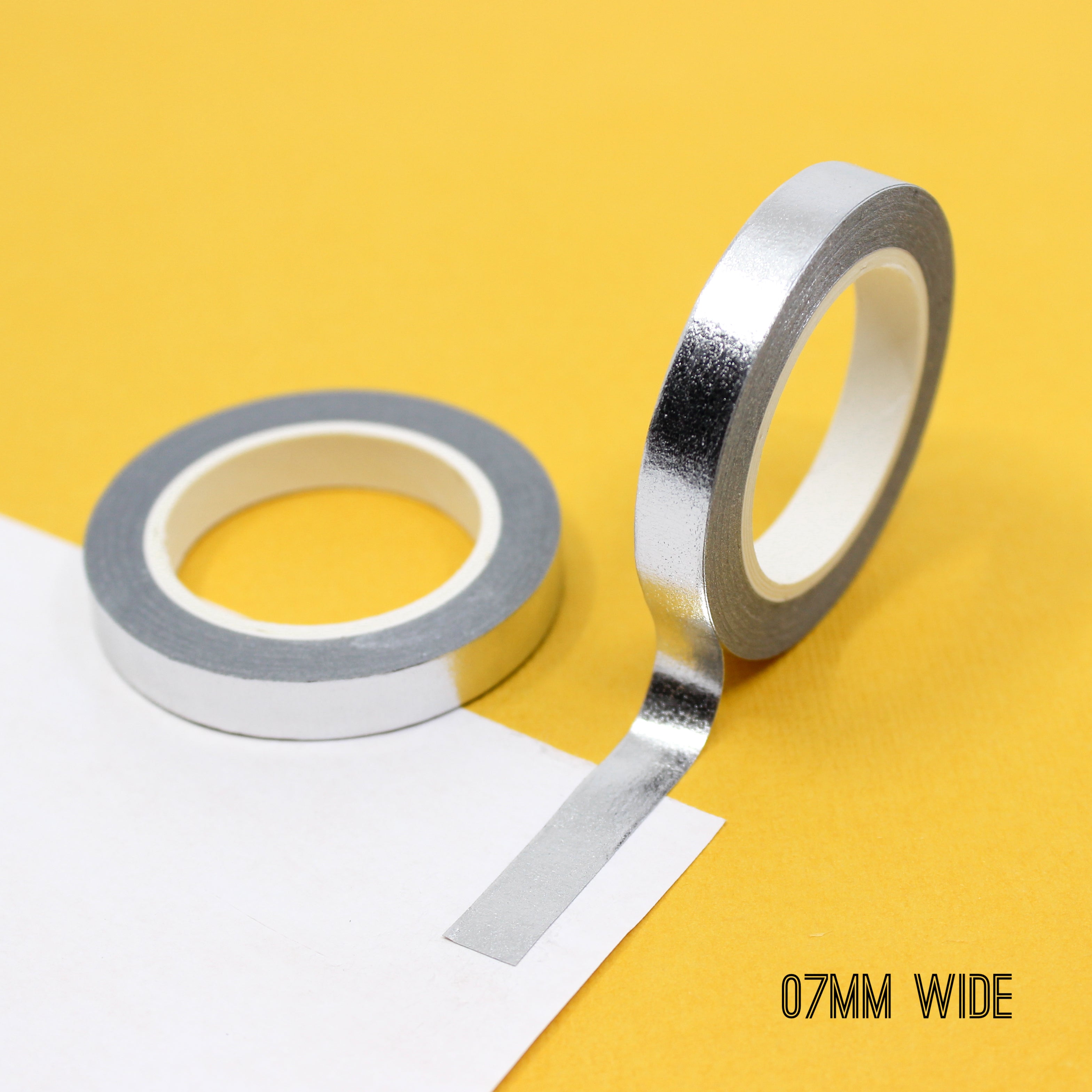 Infuse your projects with a shimmering elegance using our solid foil silver washi tape, adorned with a lustrous and reflective silver foil, creating a striking and eye-catching effect. This tape is sold exclusively at BBB Supplies Craft Shop.