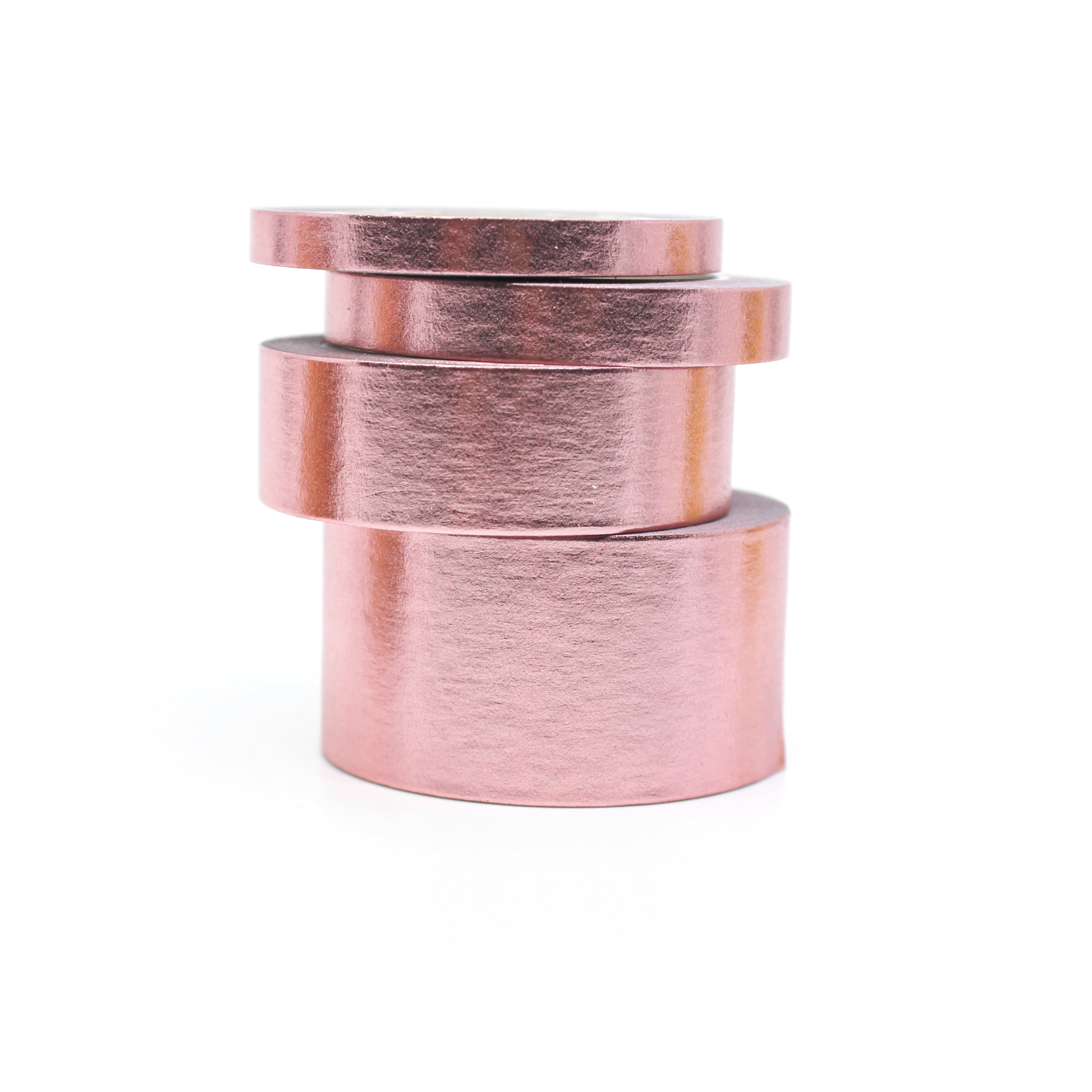 Elevate your creations with our captivating solid foil rose gold washi tape, showcasing a smooth and shiny surface in a radiant gold color, perfect for adding a touch of opulence and sophistication. This tape is sold exclusively at BBB Supplies Craft Shop.