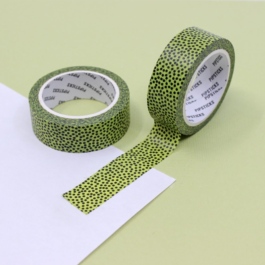 Spotted Lime Green Dots Pattern Washi Tape: Bright lime green tape featuring playful dot patterns, ideal for adding a pop of color and fun to your planners, journals, and DIY projects. This tape is from Pipsticks and sold at BBB Supplies Craft Shop.