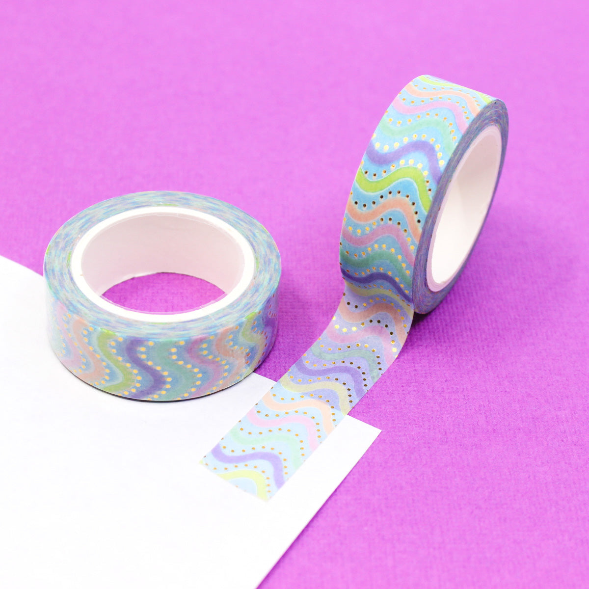 Add a vibrant and dynamic touch to your projects with this colorful rainbow swivel chevron washi tape. Perfect for adding a playful and stylish element to your crafts, journals, and more. This tape is sold at BBB Supplies Craft Shop.