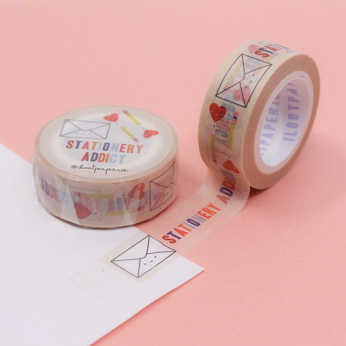 "Beige Stationery Addict Washi" showcases a delightful assortment of stationery-themed designs on a soft beige background, perfect for adding a touch of creativity and elegance to your planners, journals, and craft projects.
