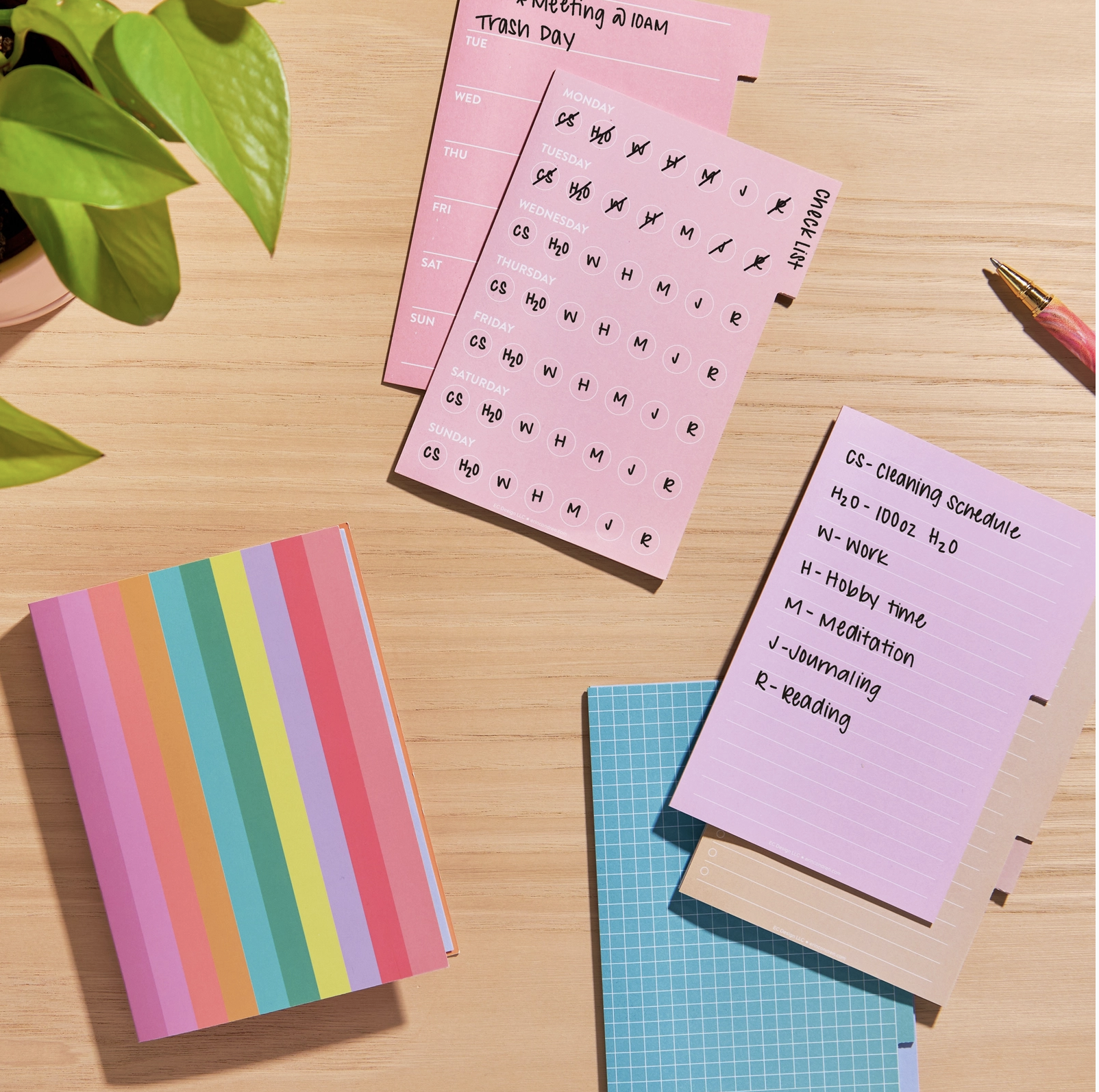 Minimalist sticky note tabs used inside a bullet journal for page organization and marking.