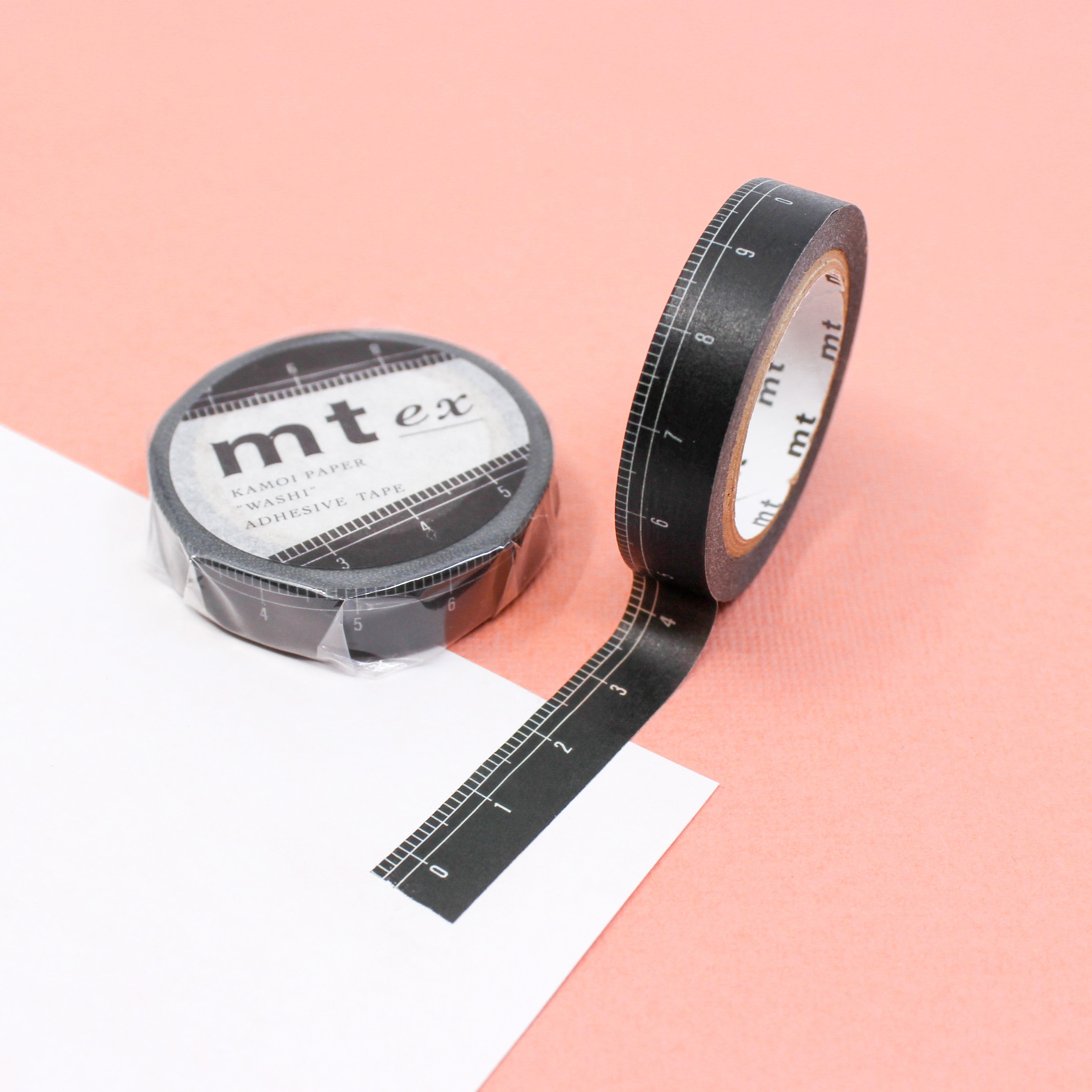 Stay organized with our thin black ruler washi tape, featuring a sleek design that mimics the appearance of a ruler, perfect for adding a practical and minimalist touch to your crafts. This tape is from MT Brand Washi tape and sold at BBB Supplies Craft Shop.