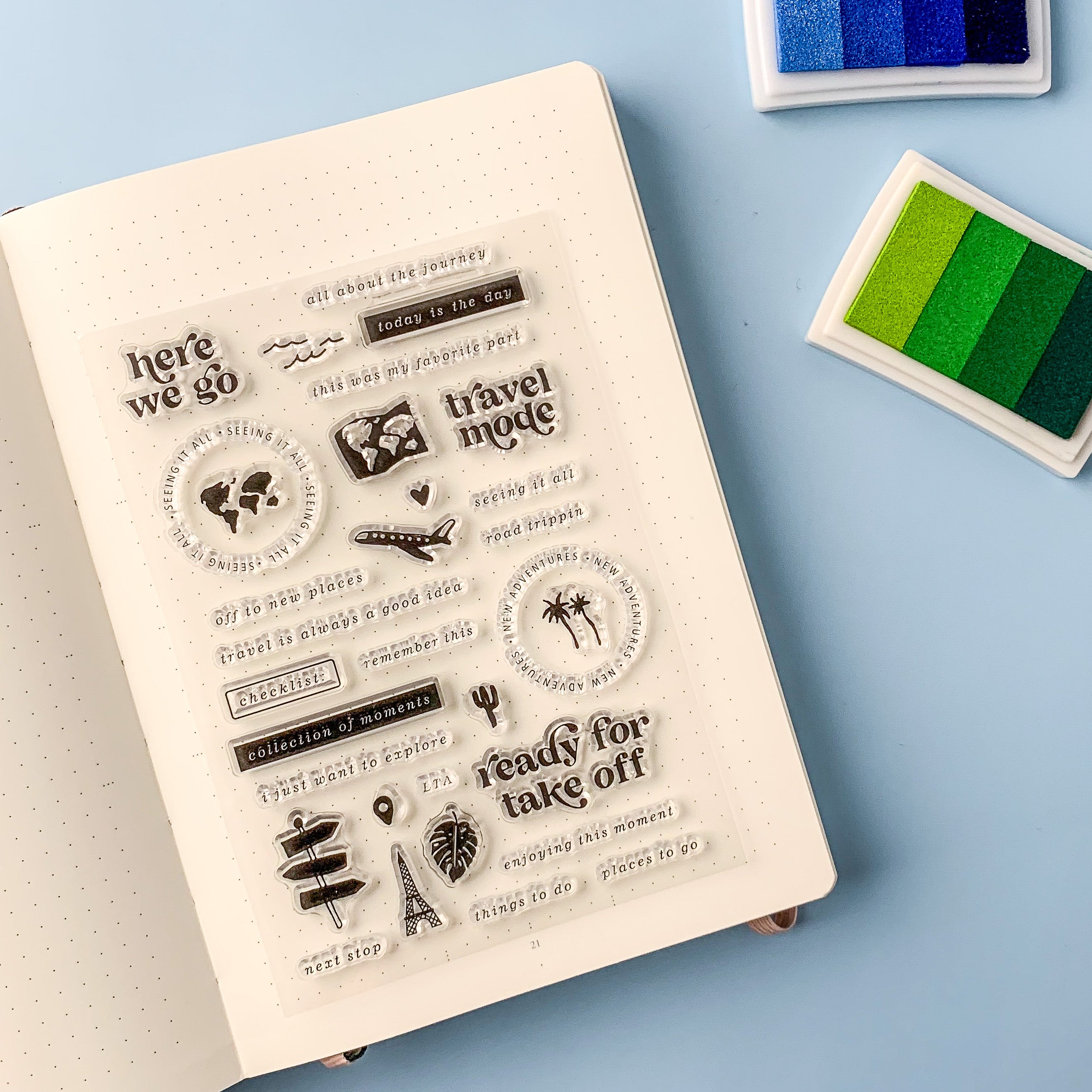  "Here We Go" Travel Journal Stamps: Capture your adventures with these charming travel-themed stamps. Featuring whimsical illustrations of suitcases, planes, and maps, these stamps are perfect for adding a touch of wanderlust to your travel journal. Whether you're documenting a road trip or a globe-trotting adventure, these stamps are a fun and creative way to preserve your memories. These stamps are sold at BBB Supplies Craft Shop.