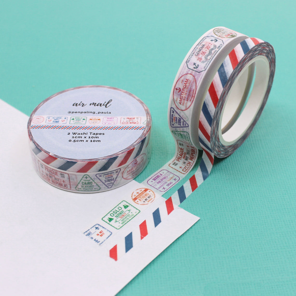 "Air Mail Stamps and Strips Washi Set" offers a charming collection of vintage-inspired airmail designs, featuring classic stamps and striped patterns. Ideal for adding a touch of nostalgic travel flair to your letters, planners, and creative projects.