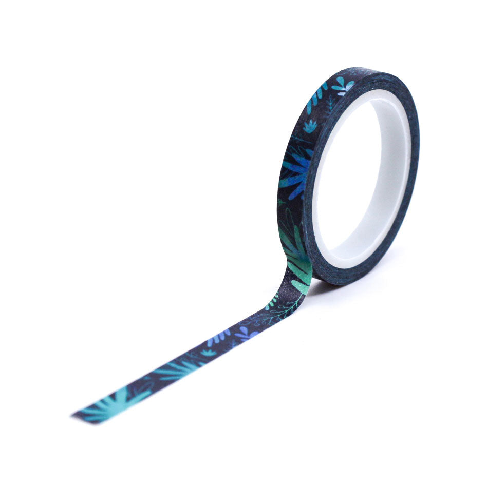 Navy and green jungle leaf pattern washi tape shown beside the roll.