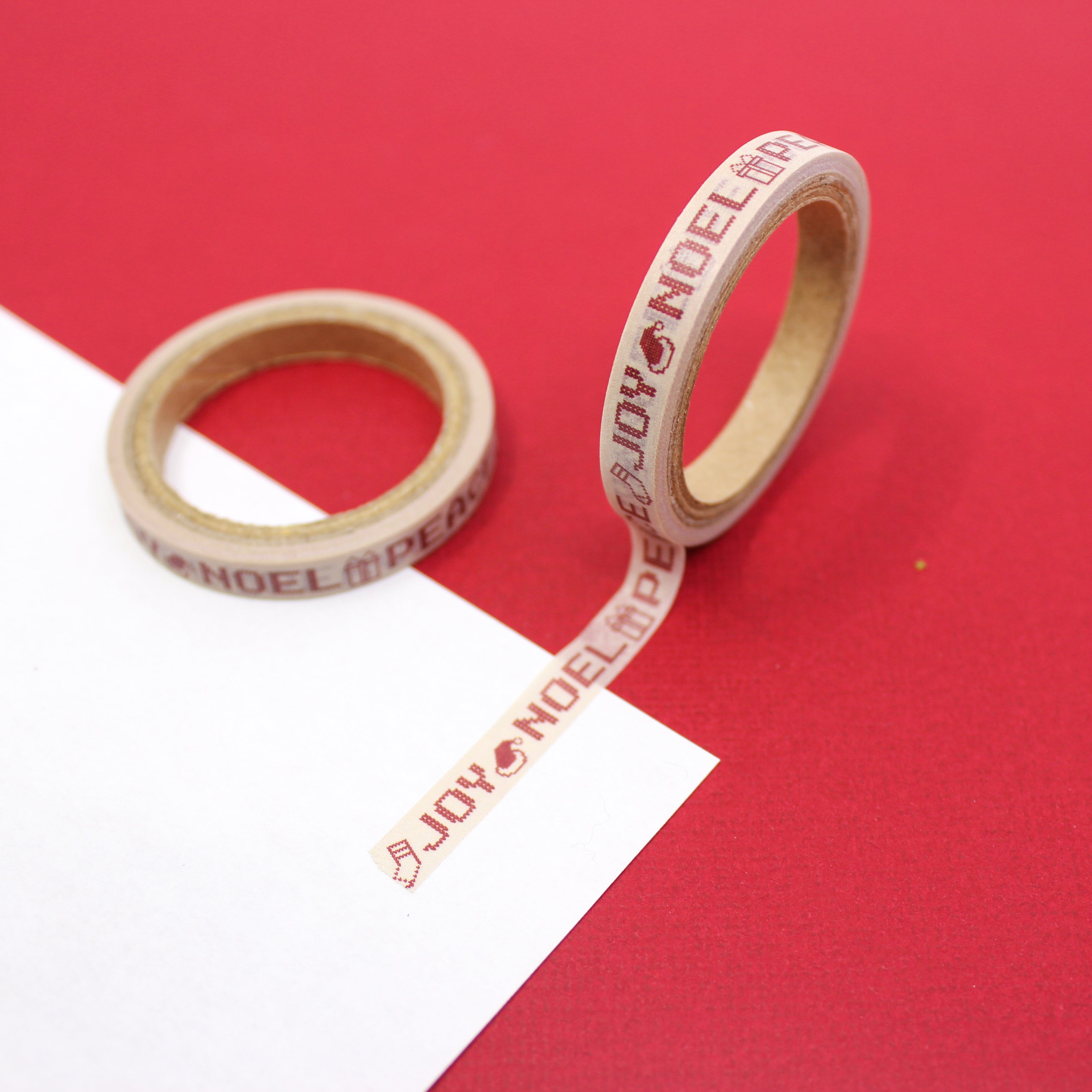 Infuse your creations with the spirit of vintage Christmas using our Washi tape adorned with classic holiday phrases, capturing the warmth and nostalgia of traditional holiday greetings. This tape is sold at BBB Supplies Craft Shop.