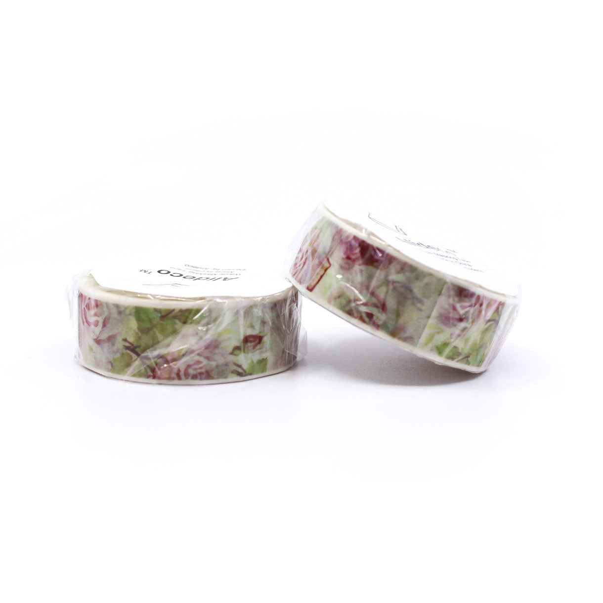 Vintage-inspired floral washi tape styled with stationery on pastel backdrop.