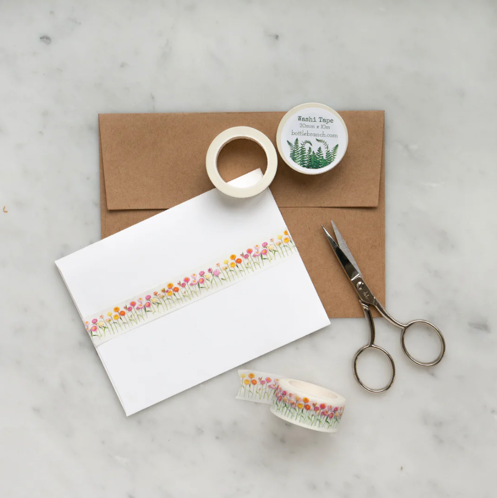 Elevate your crafts with our exquisite pink strawflower washi tape, adorned with intricate floral designs that exude grace and beauty. Add a touch of delicate elegance with our pink strawflower washi tape, featuring charming floral patterns in shades of pink, orange, and yellow. This tape is designed by bottle branch and sold at BBB Supplies Craft Shop.