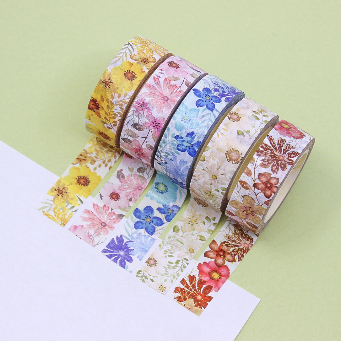 Infuse your creations with the charm of blooming flowers using our washi tape, adorned with delightful floral illustrations that evoke the beauty of nature and the joy of creativity. This washi tape is sold at BBB Supplies Craft Shop.