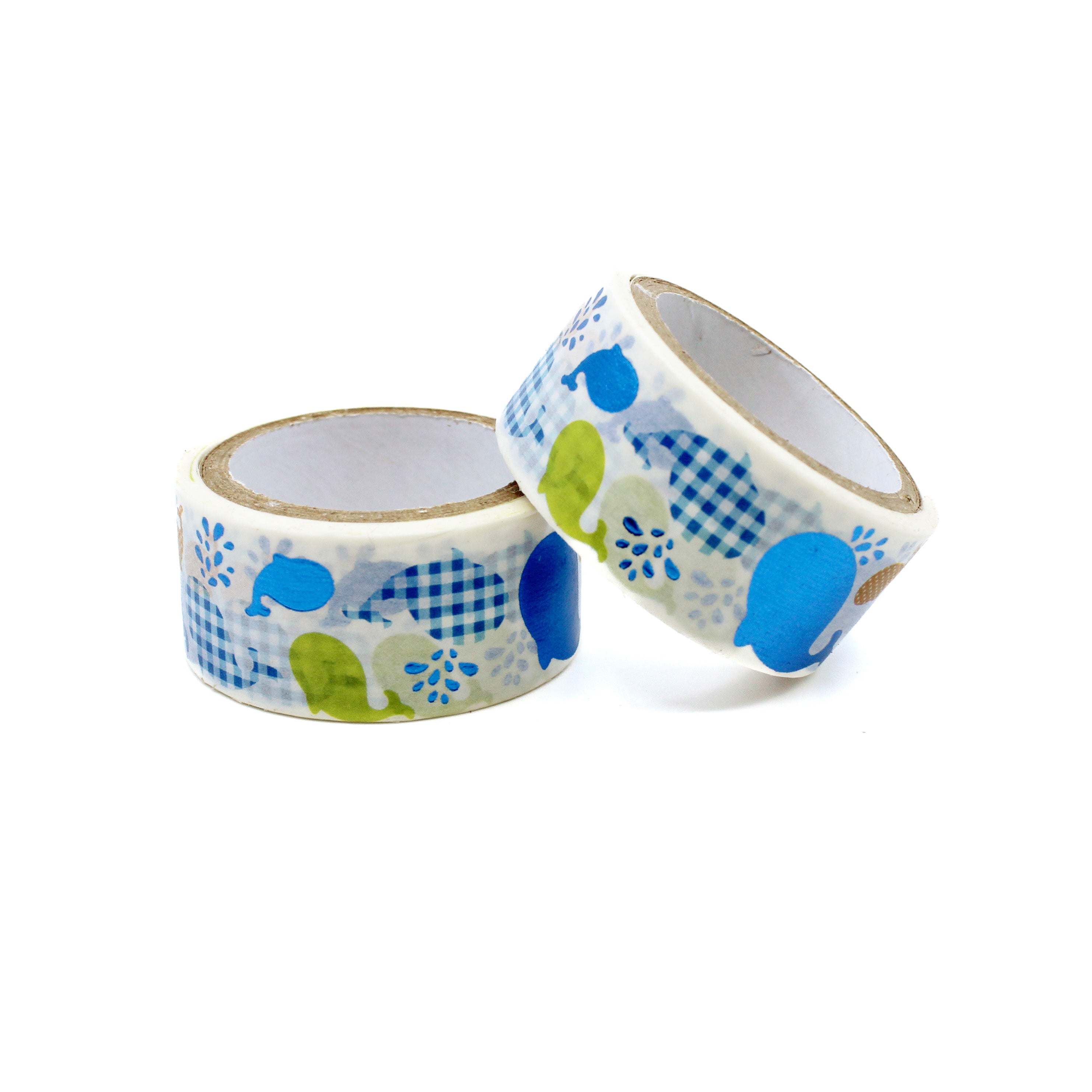 Two rolls of decorative ocean-themed washi tape featuring playful whale patterns.