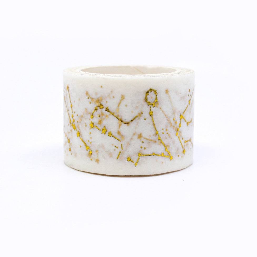 Illuminate your projects with our Wide Gold Foil Starry Night Sky Constellation Washi Tape, adorned with shimmering constellations in a luxurious gold finish. Ideal for adding a touch of celestial wonder to your crafts. This tape is sold at BBB Supplies Craft Shop.