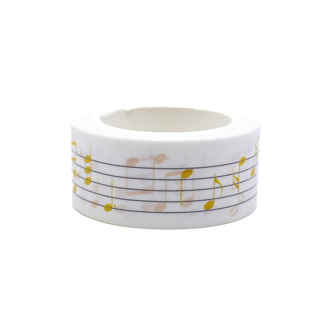 Add a musical flair to your projects with this wide washi tape featuring yellow music notes. Perfect for music enthusiasts or anyone looking to add a playful touch to their crafts. This tape is sold at BBB Supplies Craft Shop.