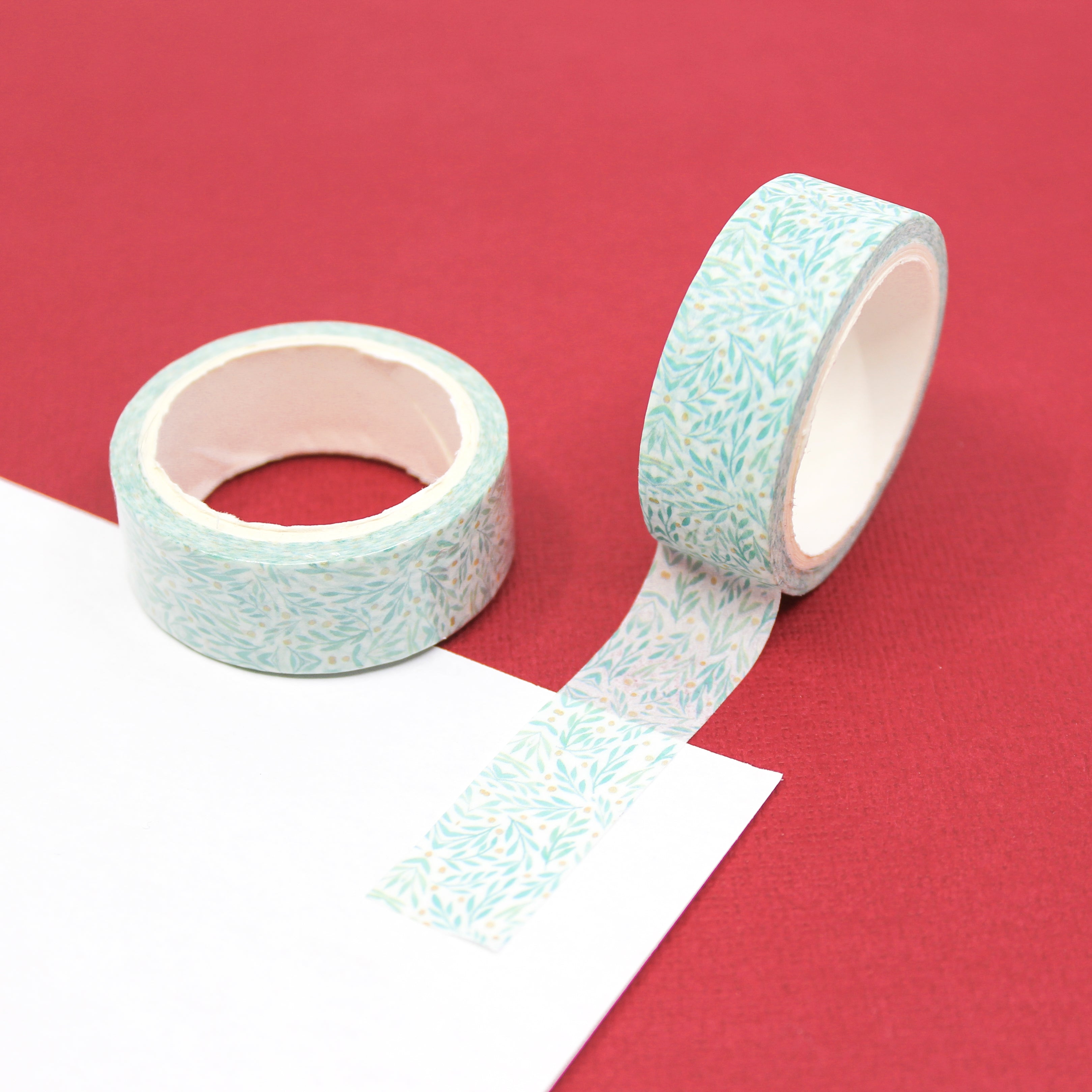 Embrace the holiday spirit with our Holiday Holly Print Washi Tape, featuring a classic holly pattern. Perfect for adding a touch of festive elegance to your projects. This tape is sold at BBB Supplies Craft Shop.