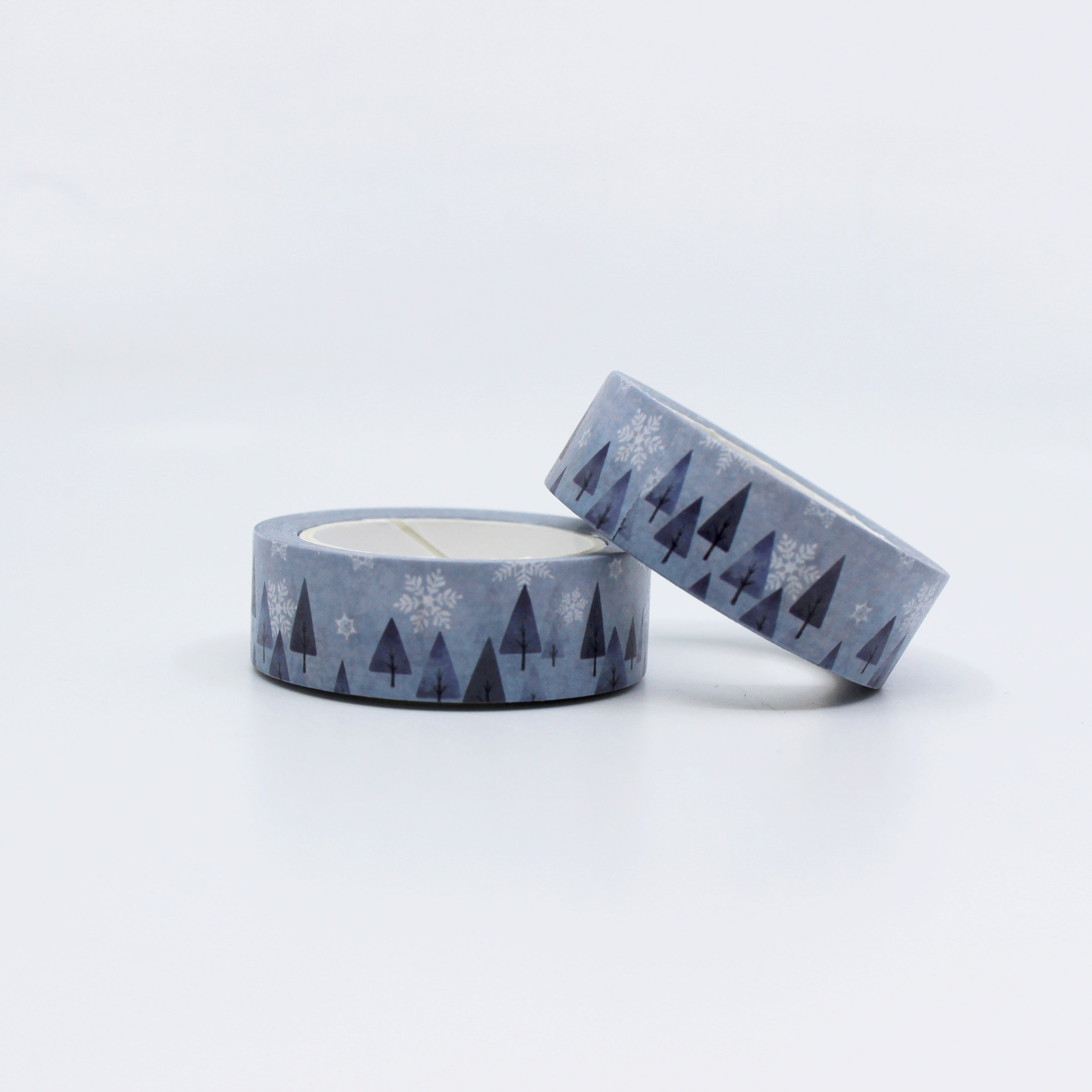 Embrace the cozy charm of winter with our Nordic Winter Trees and Snowflakes Washi Tape, featuring serene tree and snowflake patterns. Perfect for adding a touch of Scandinavian-inspired beauty to your projects. This tape is sold at BBB Supplies Craft Shop.