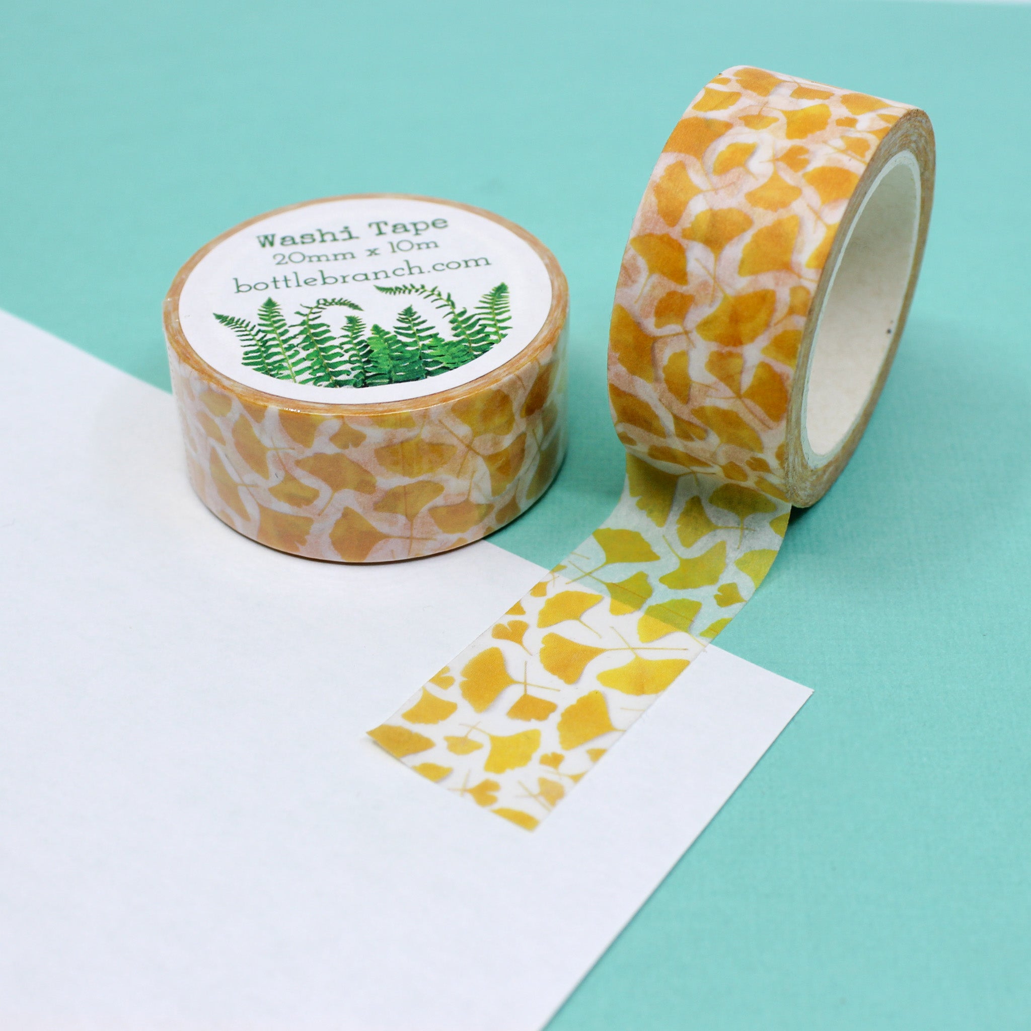 Infuse your projects with the charm of ginkgo leaves using our yellow ginkgo leaf washi tape, adorned with delicate yellow ginkgo leaves for a touch of botanical beauty. This tape is designed by Bottle Branch and sold at BBB Supplies Craft Shop.