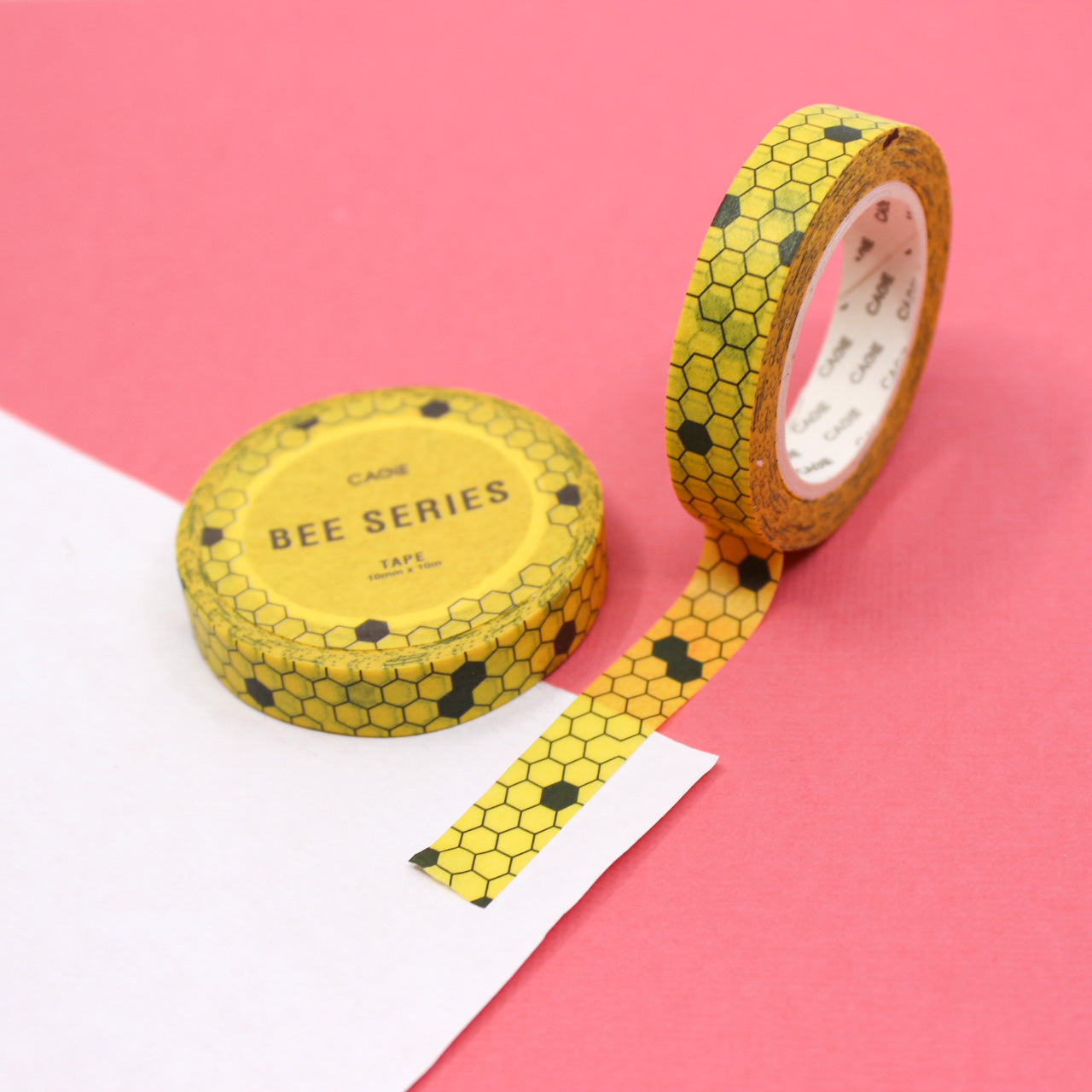 Embrace the buzz of creativity with our Yellow Honeycomb Bumble Bee Washi Tape, featuring delightful honeycomb and bumble bee designs. Ideal for adding a touch of nature's beauty to your crafts. This tape is sold at BBB Supplies Craft Shop.