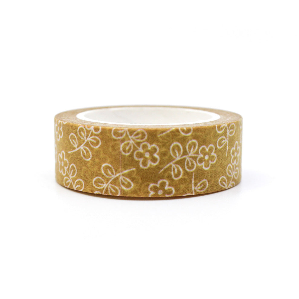 This vibrant washi tape features a pattern of yellow daisy flowers, perfect for adding a cheerful touch to your crafts and projects. This tape is sold at BBB Supplies Craft Shop.