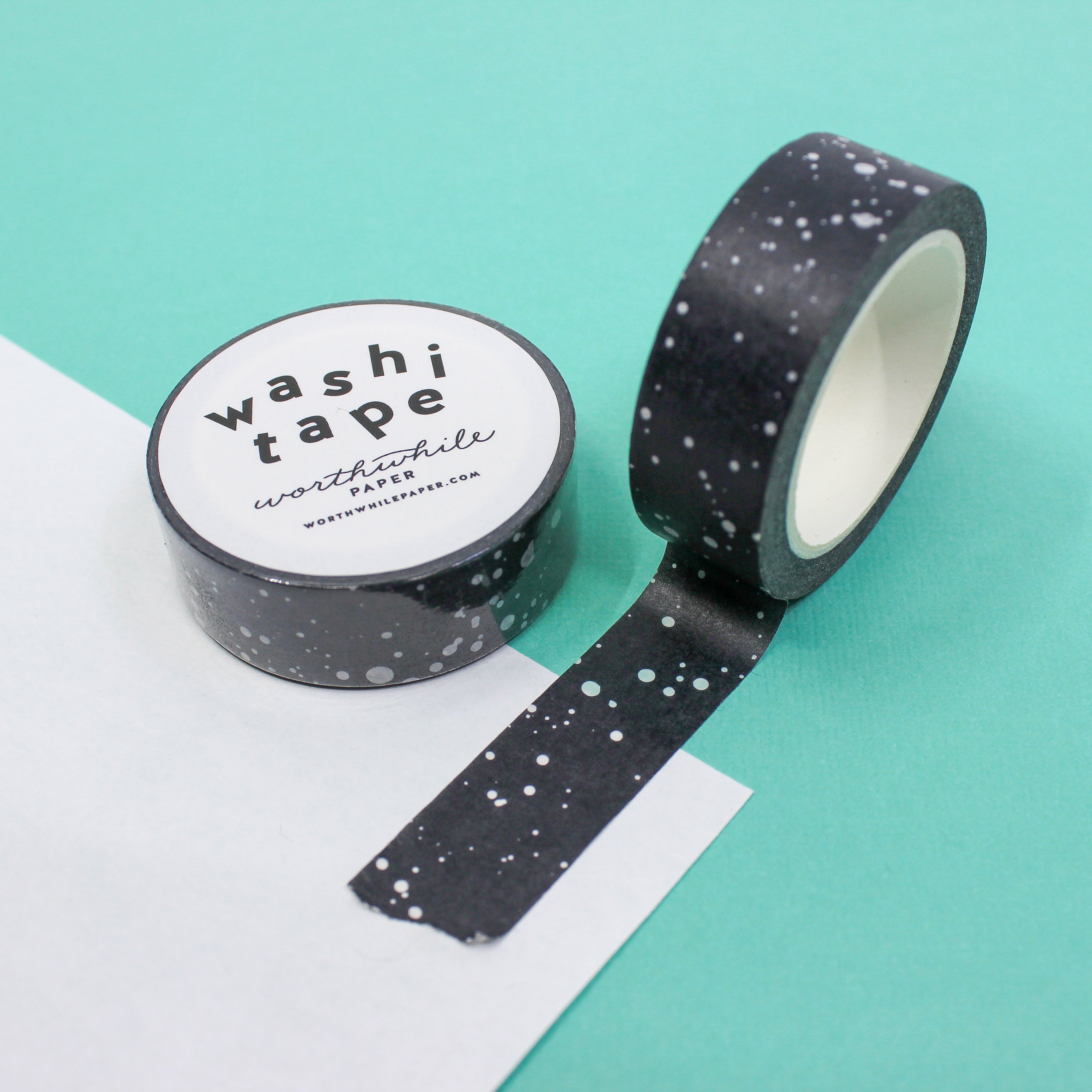 This photo is of a modern and fun black and white paint splatter washi tape from worthwhile paper and sold at BBB Supplies craft and journaling shop.