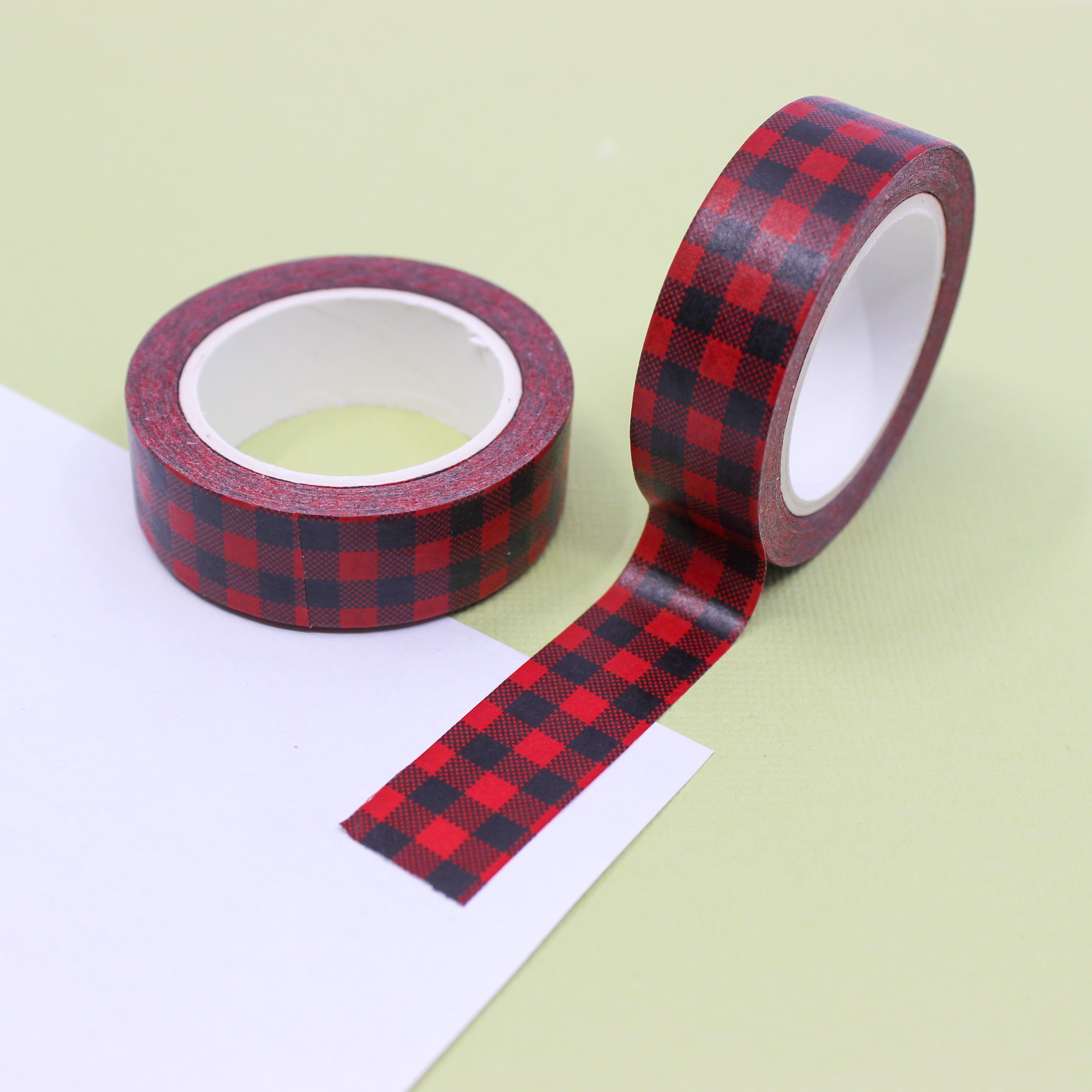 This is a black and red buffalo checkered plaid pattern washi tape from BBB Supplies Craft Shop