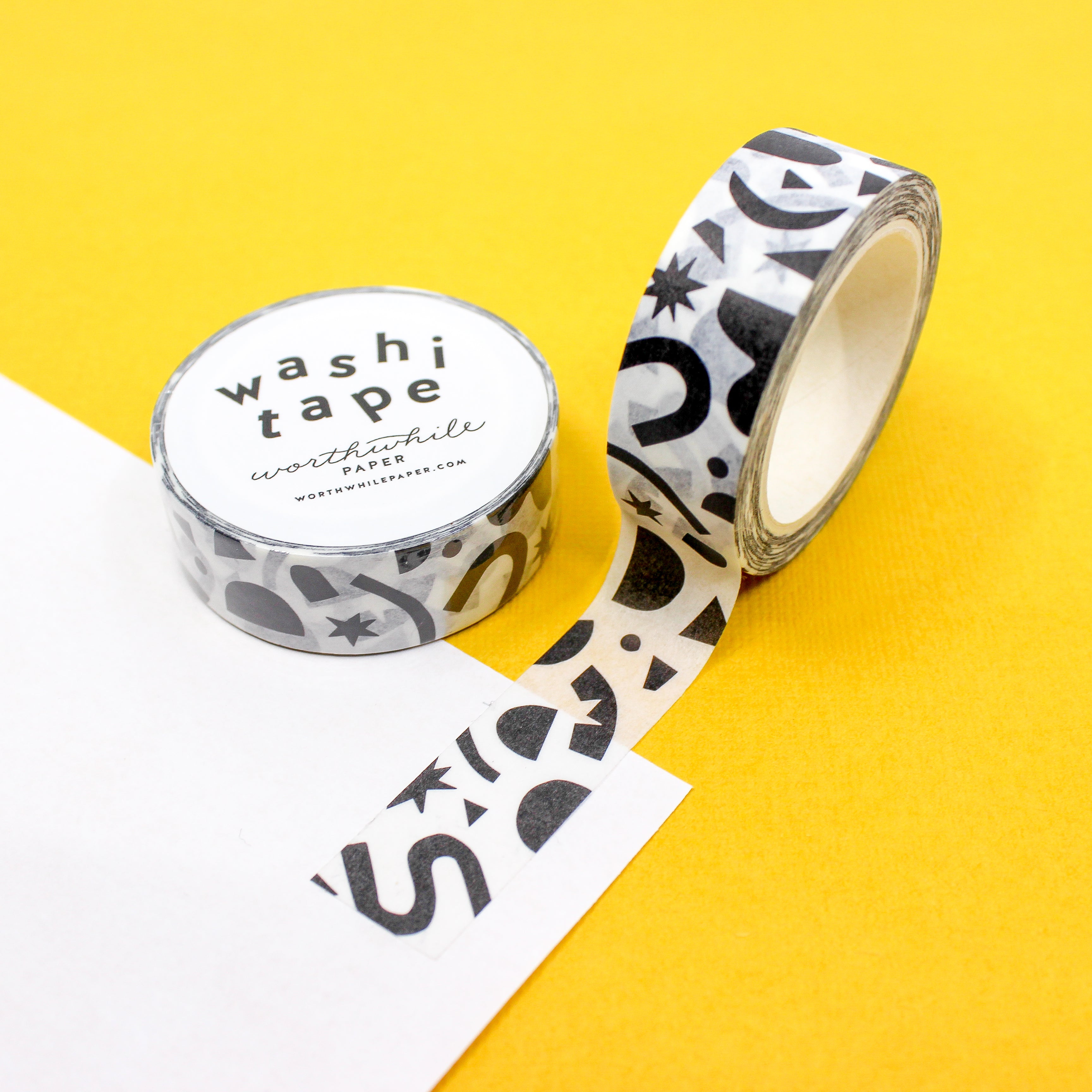 This photo is of a black and white geometric shapes confetti washi tape from worthwhile papers and sold at BBB Supplies craft and journaling shop.