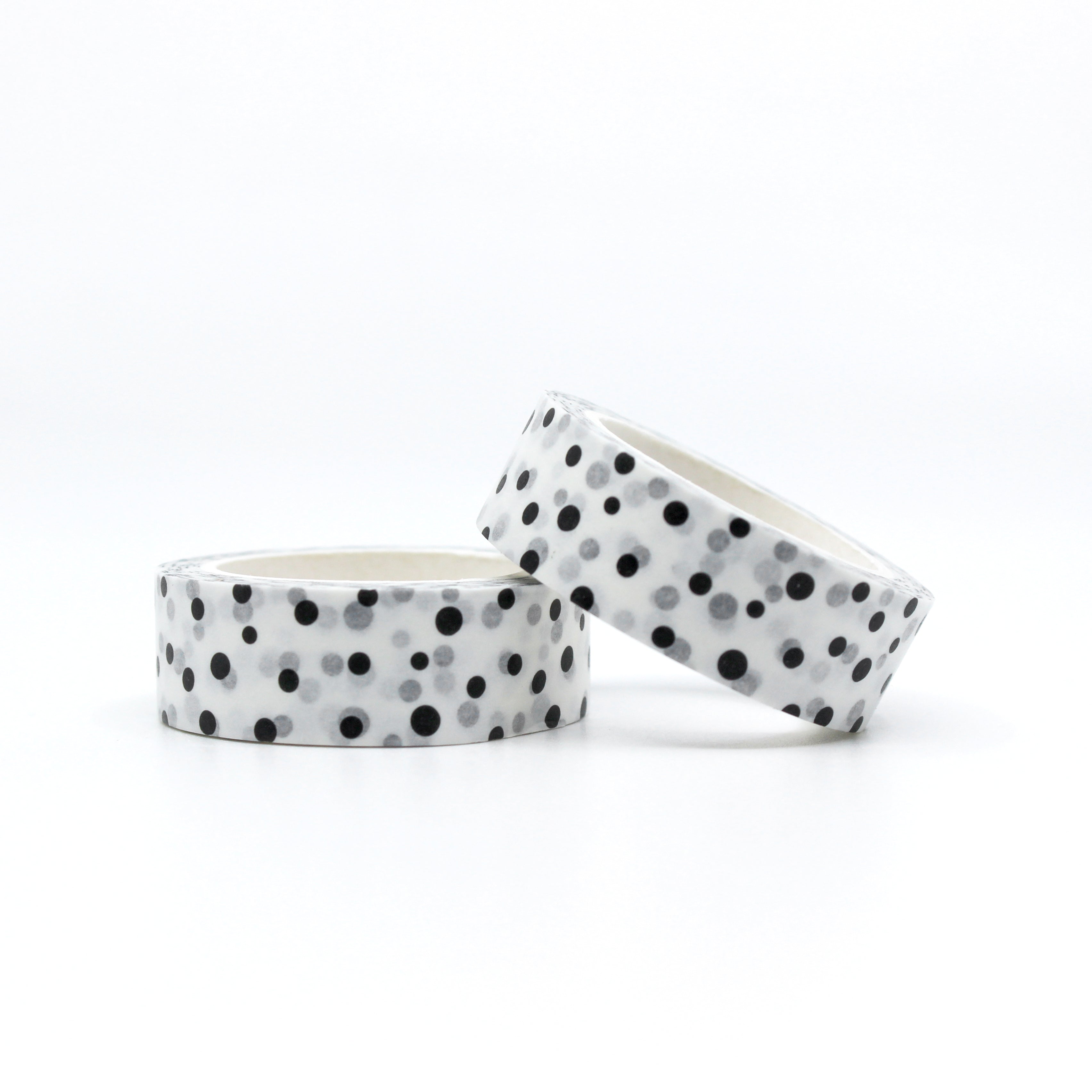 This is a roll of black polka dots with white background washi tapes from BBB Supplies Craft Shop