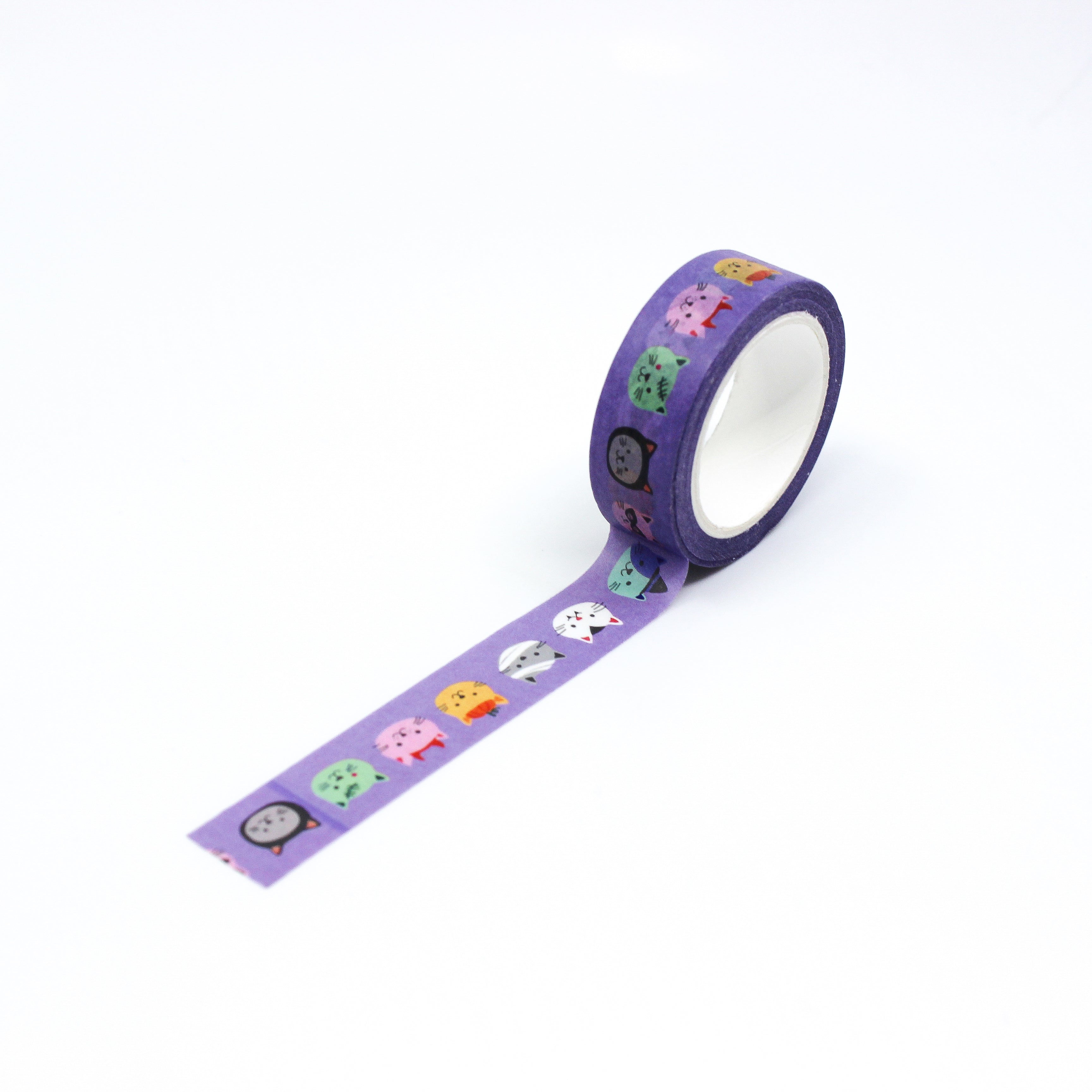 This is a roll of colorful faces of kitten in purple background thanksgiving washi tapes from BBB Supplies Craft Shop