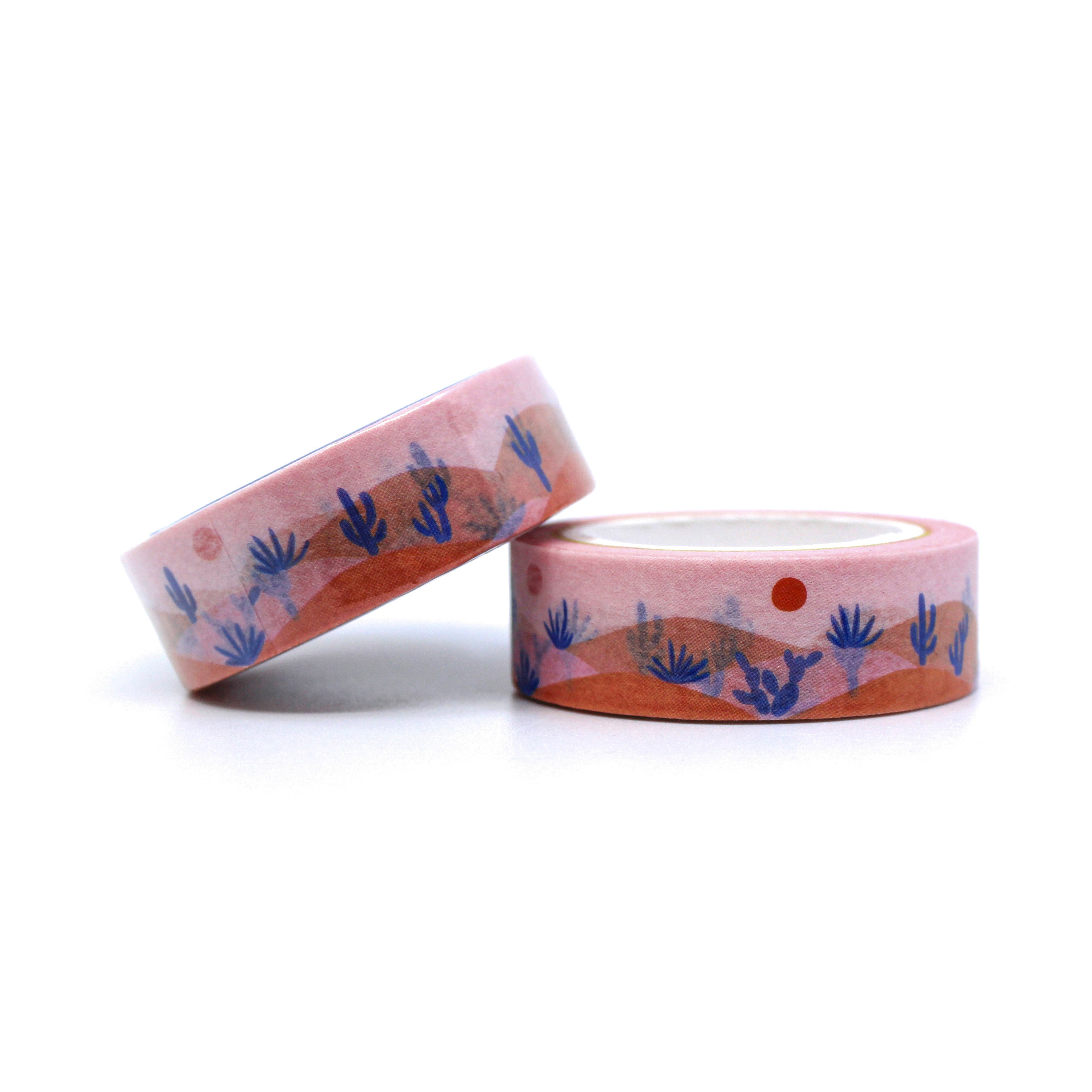 This is a roll of pink desert landscape with with purple succulents and Cacti washi tapes perfect for your travel journal from BBB Supplies Craft Shop