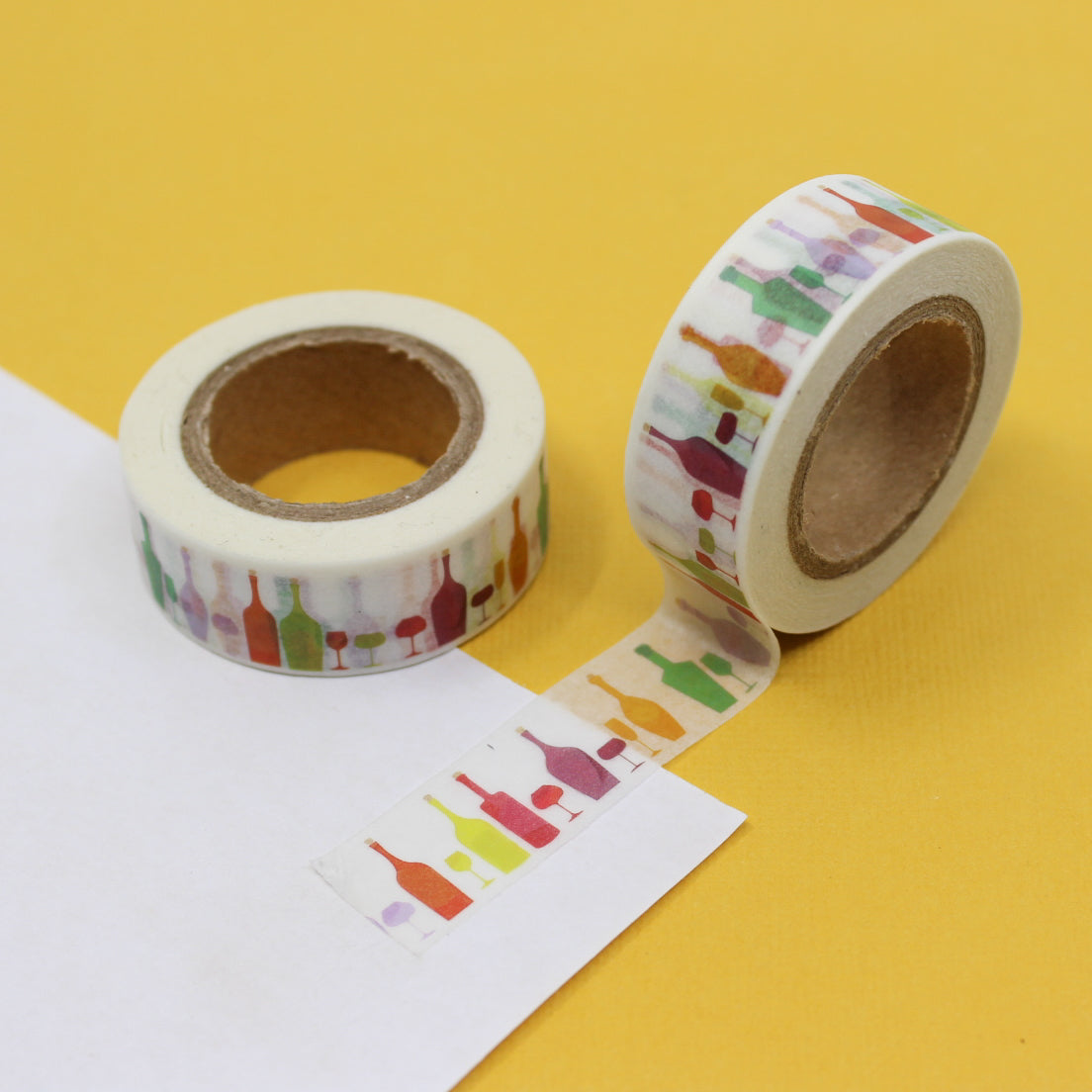 This colorful wine bottle washi tape is a perfect addition to your calendar, spread, or for your unique gift wrap collection. This tape is especially perfect for invitations to a celebration, New Year's Holiday, or a travel journal to a winery. This tape is sold at BBB Supplies Craft Shop.