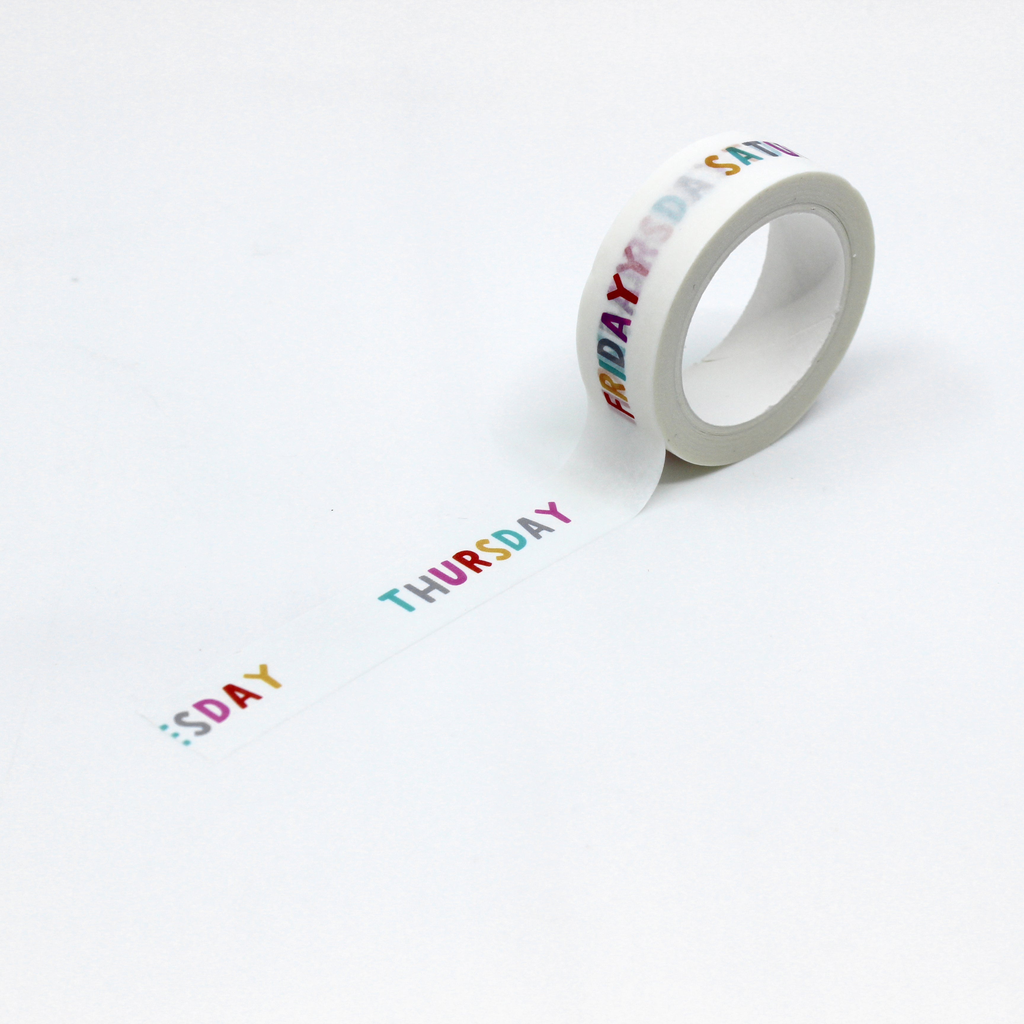 This is a full pattern repeat view of colorful days-of the -week pattern washi tape from BBB Supplies Craft Shop