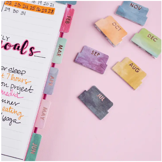 These rainbow watercolor colorful self-adhesive monthly tabs are perfect for your budget journal, bullet journal or planner if you want to set up your own monthly spread. They are designed by Erin Condren and sold at BBB Supplies Craft Shop.