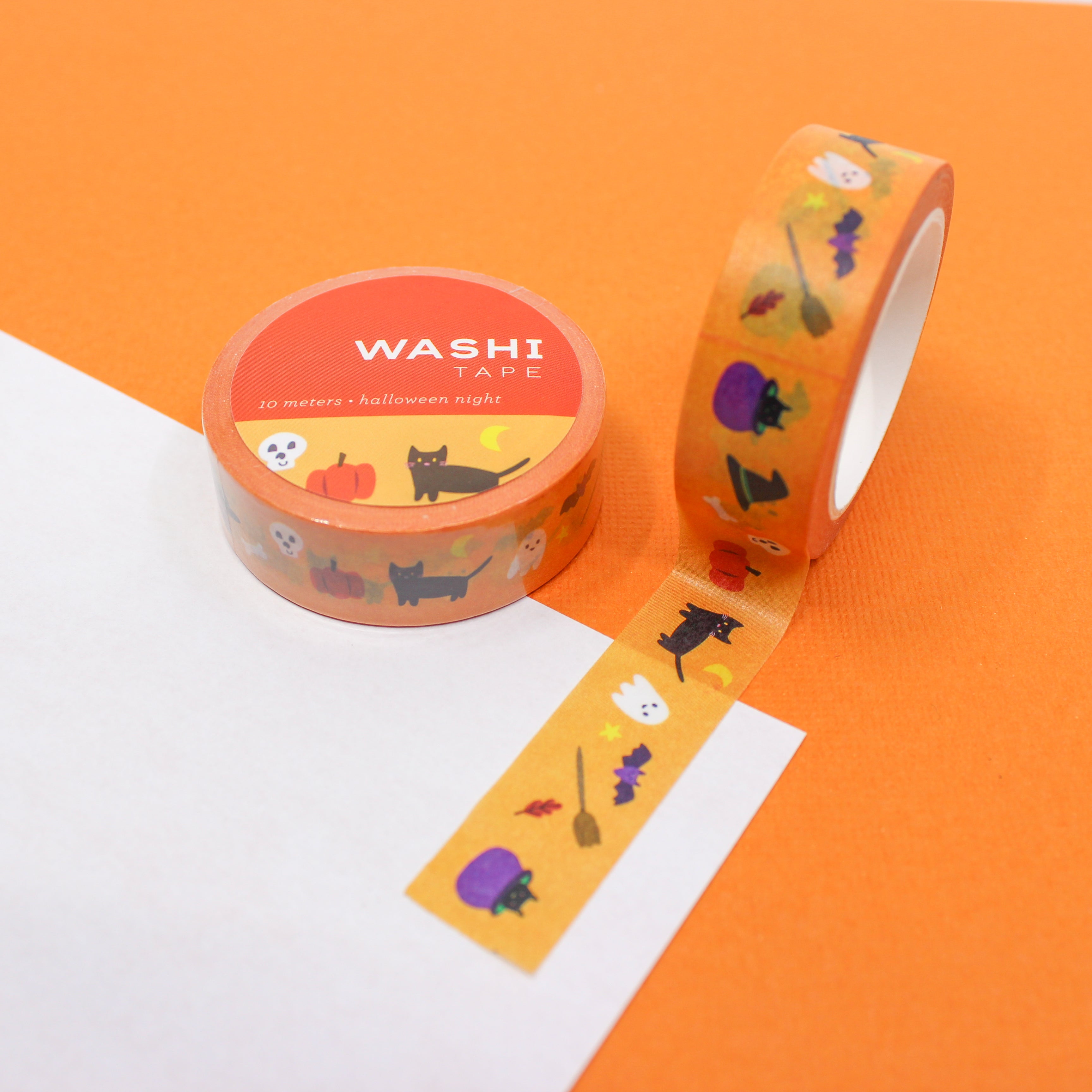 This is Halloween night themed washi tape includes fun and playfully spooky Halloween symbols such as black cat, pumpkin, white ghost, purple bat, witches broom, witches cauldron, witches hat, and skull bones from BBB Supplies Craft Shop