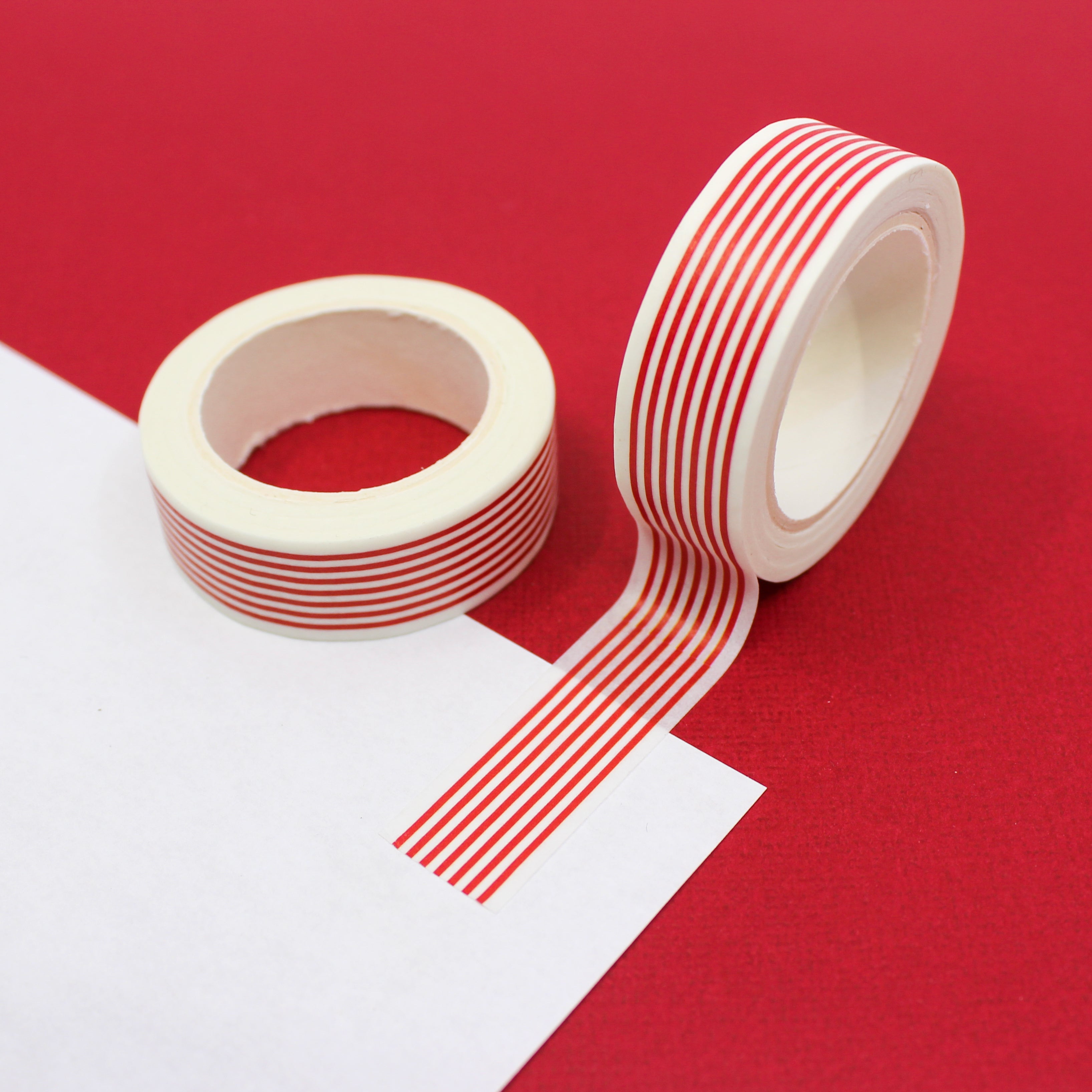 This is a thin red striped Washi Tape from BBB Supplies Craft Shop.