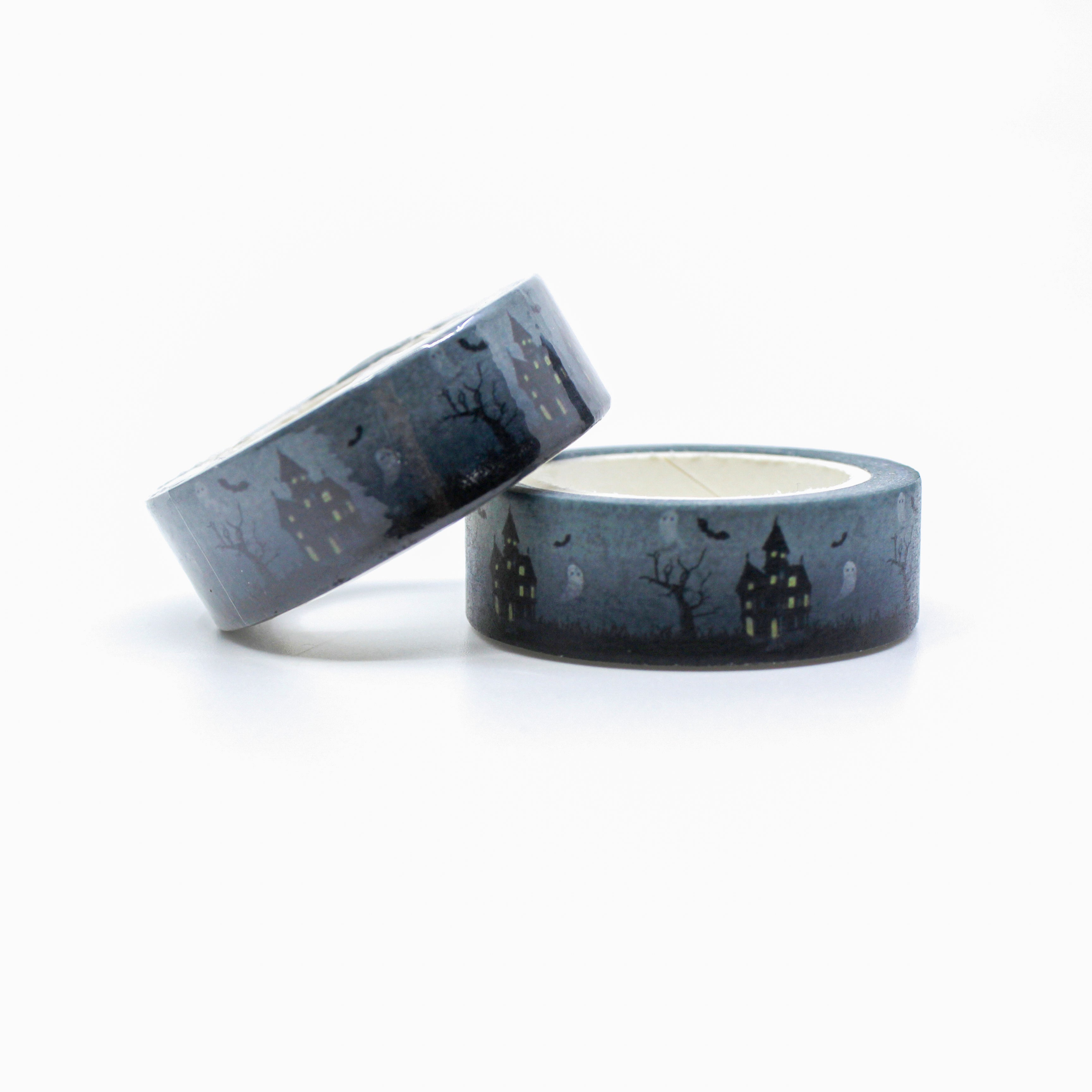 This is a roll of halloween house with haunted ghosts and black bats washi tape from BBB Supplies Craft Shop