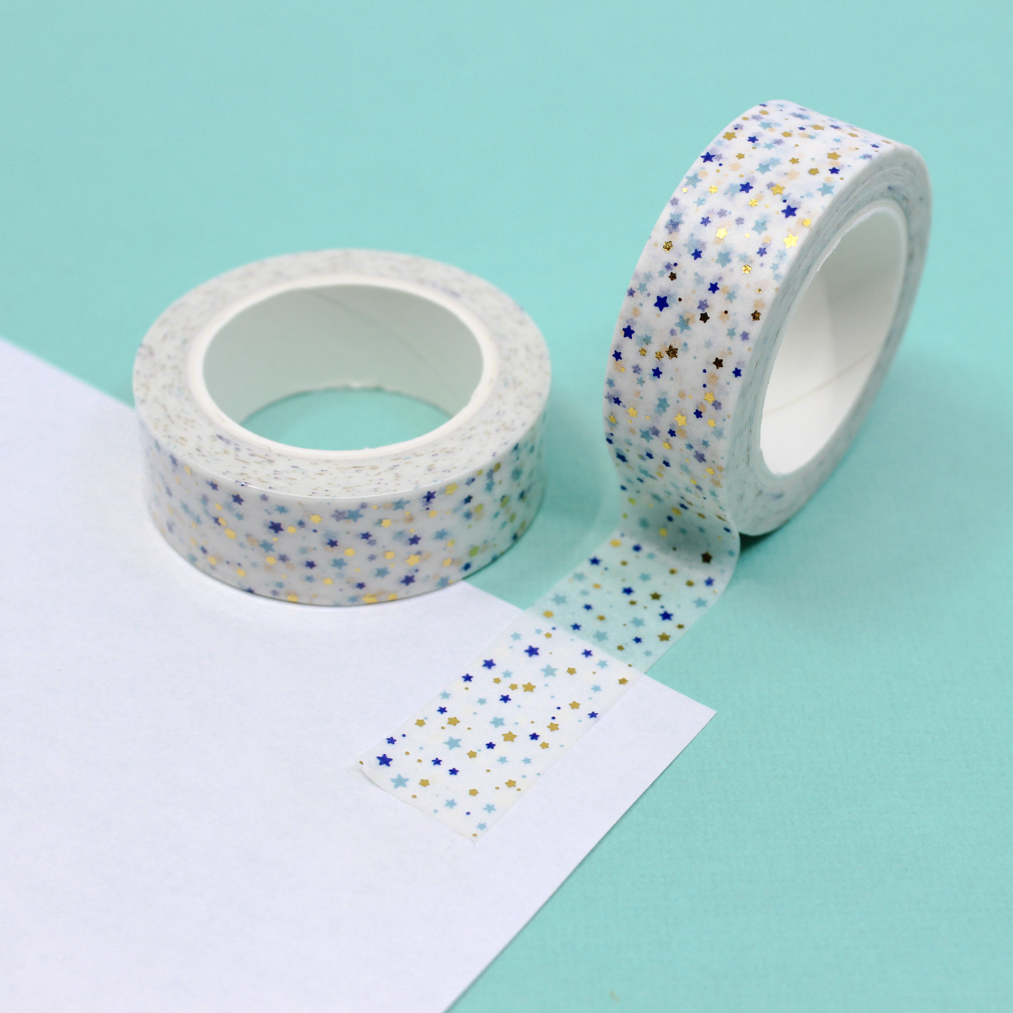 This is a little blue, black and gold little stars pattern washi tape from BBB Supplies Craft Shop