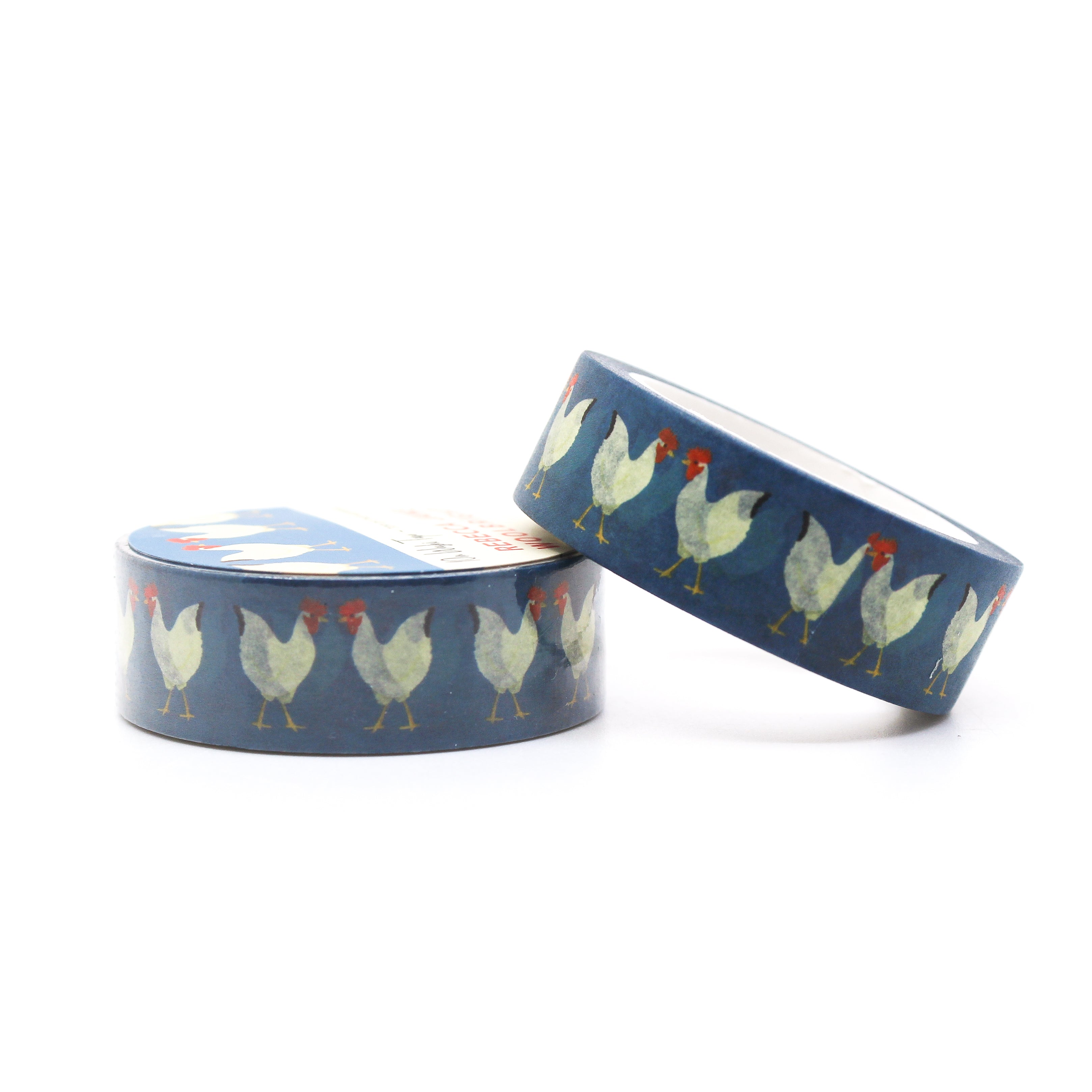 This is a roll of white cock with blue background washi tapes from BBB Supplies Craft Shop