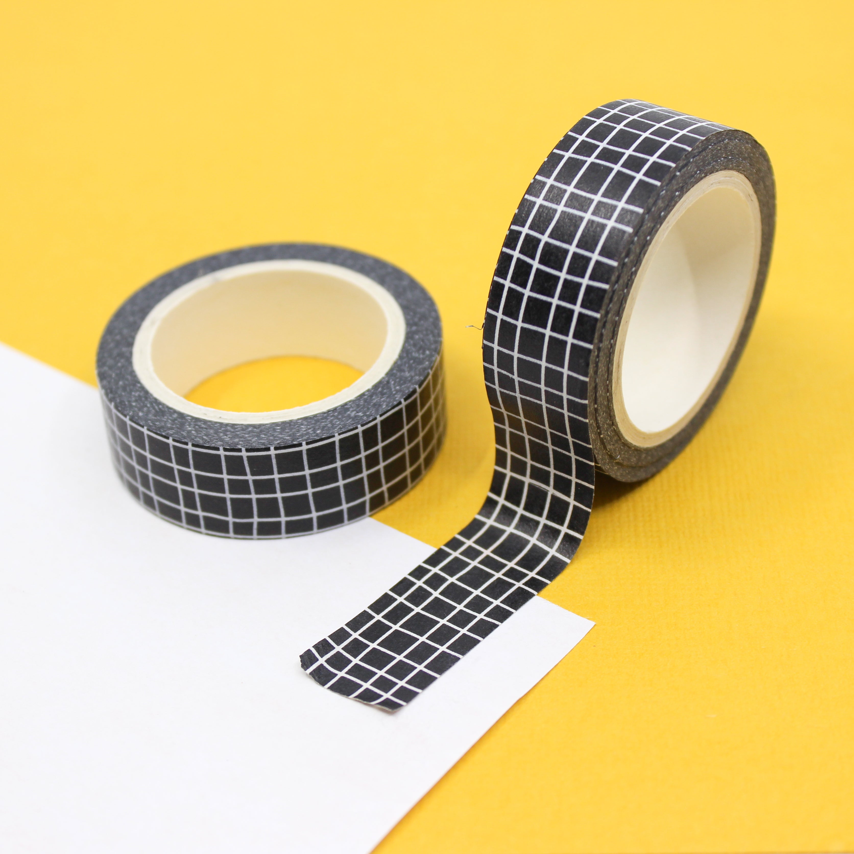 This is a black modern grid pattern view themed washi tape from BBB Supplies Craft Shop