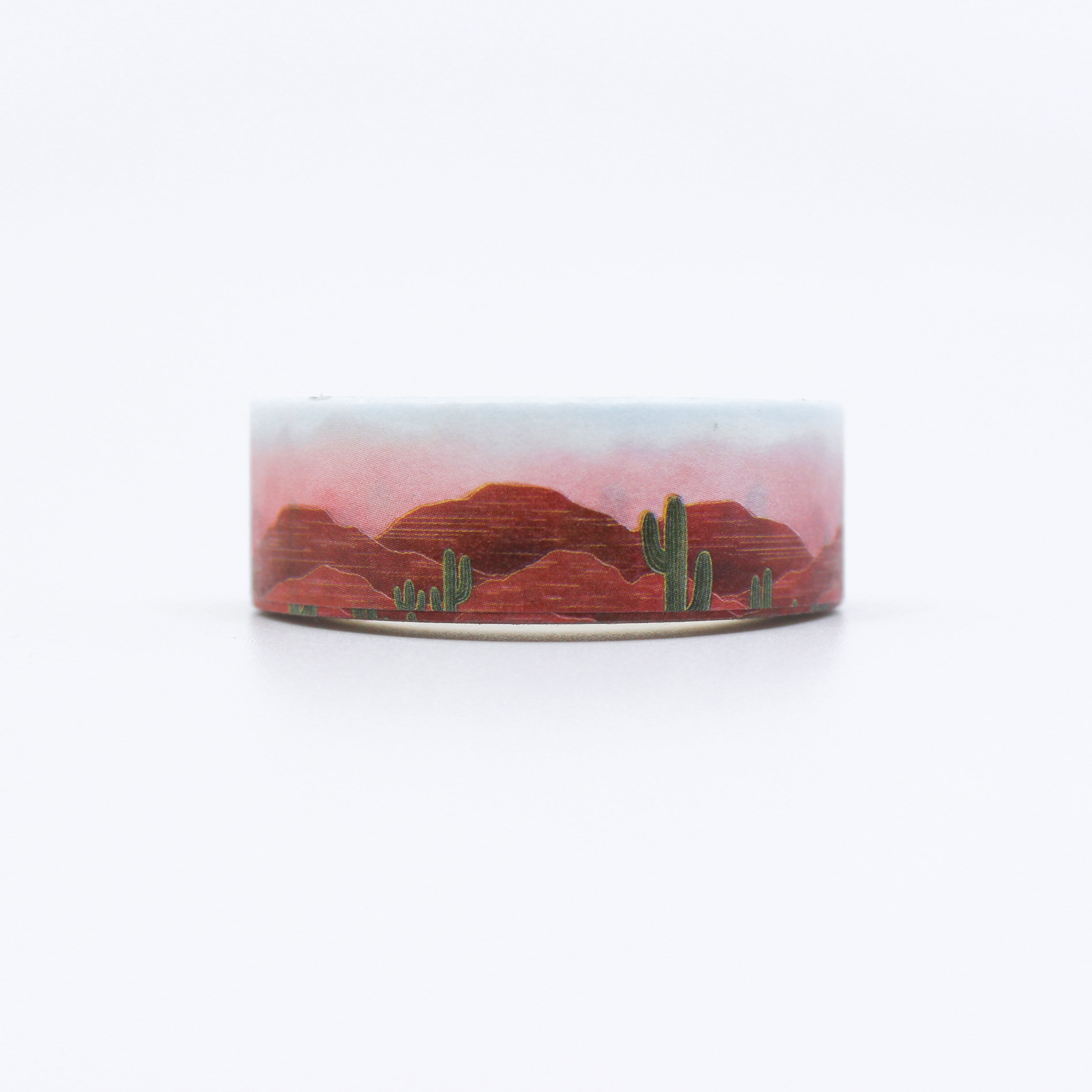 This photo shows a vibrant pink sunrise desert scape with mountains and cactus from BBB Supplies Craft and Washi Shop
