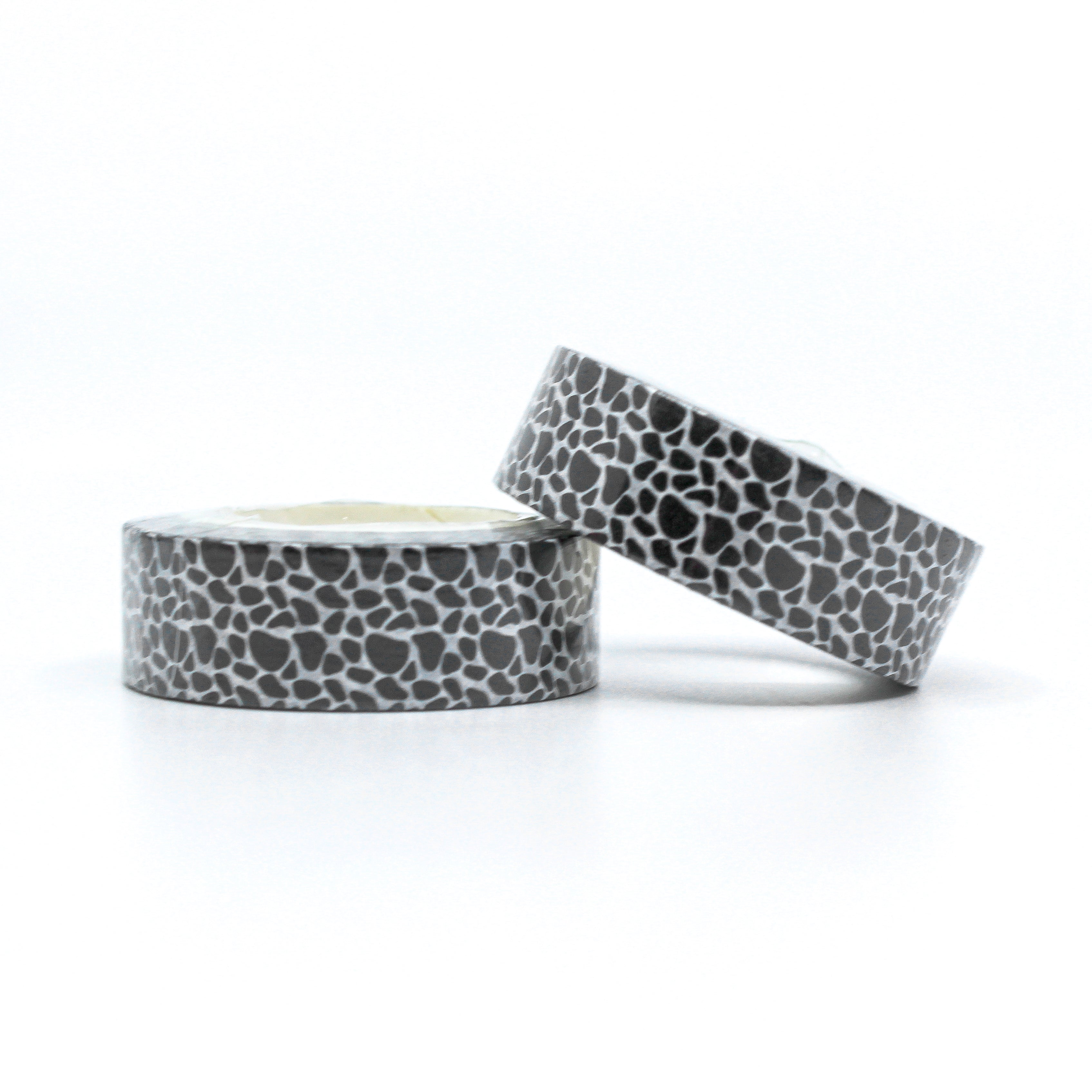 This is a roll of black cow animal prints color washi tape from BBB Supplies Craft Shop