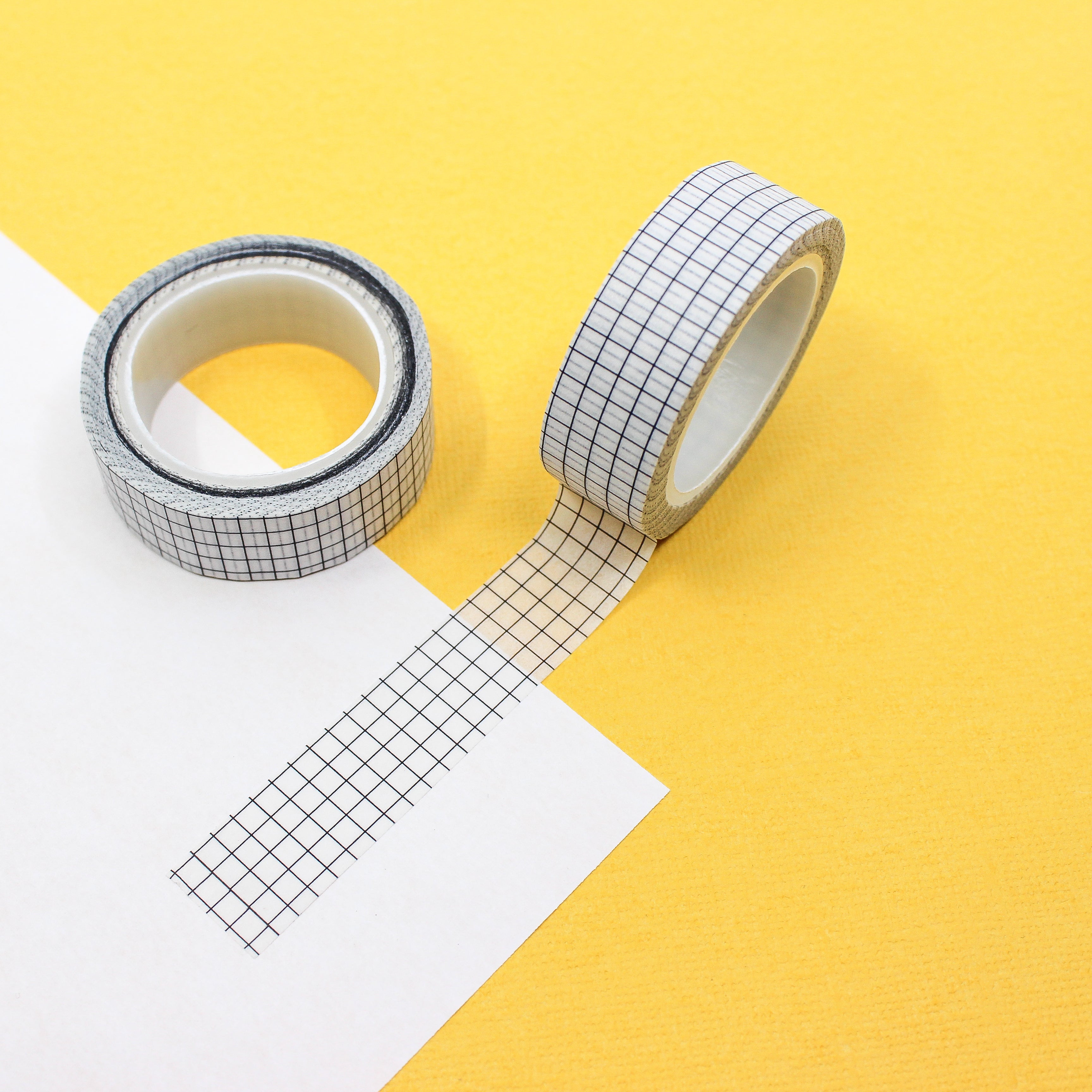 This is a white essential grid view themed washi tape from BBB Supplies Craft Shop