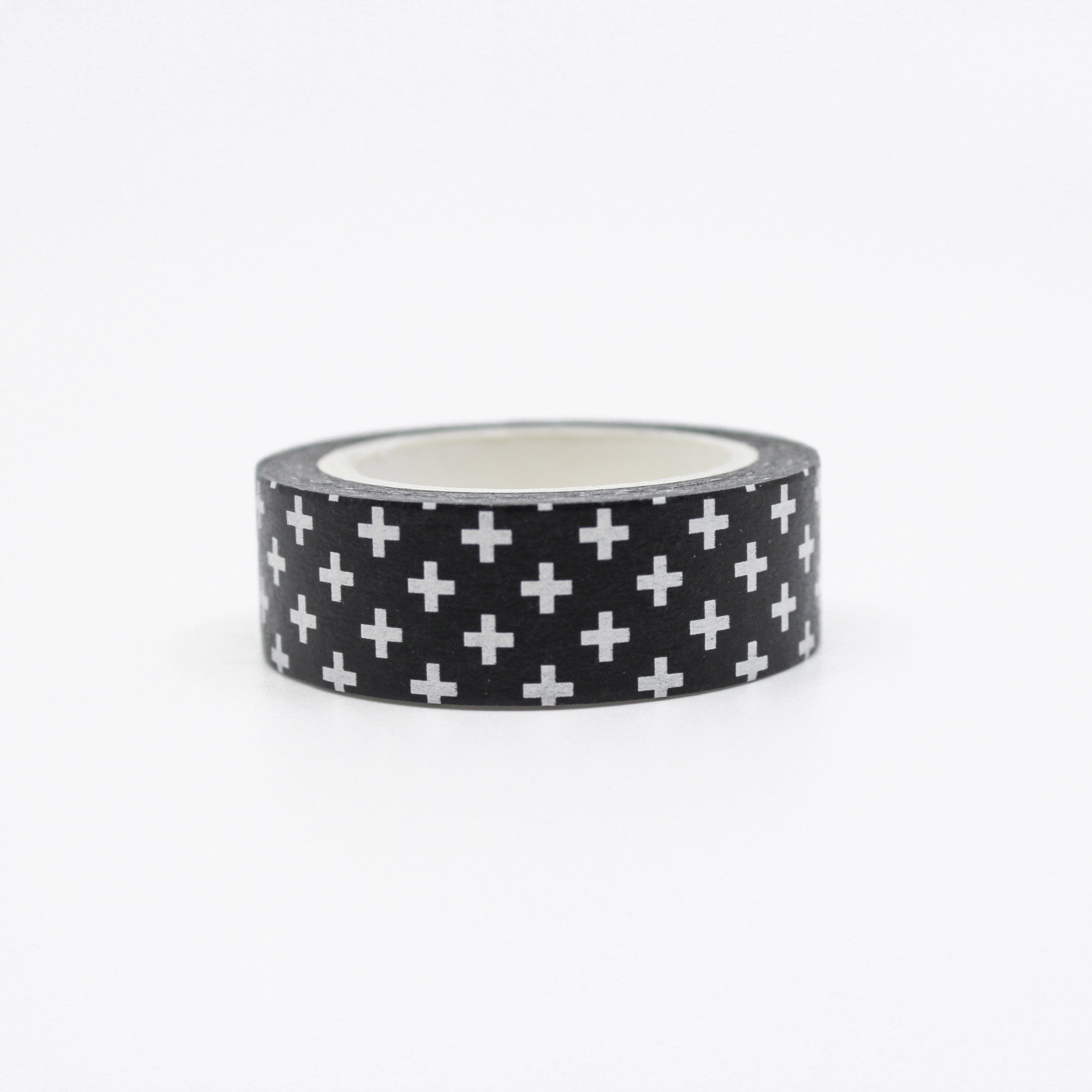 This is a white crucifix with black background washi tape from BBB Supplies Craft Shop