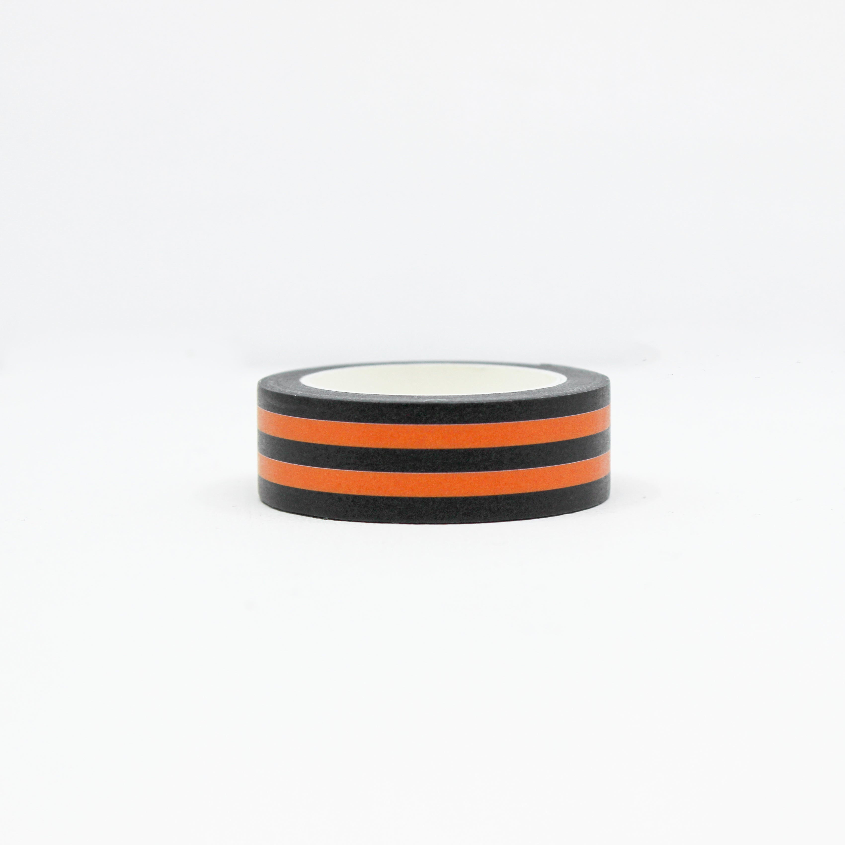 This is a linear orange and black stripe washi tape from BBB Supplies Craft Shop