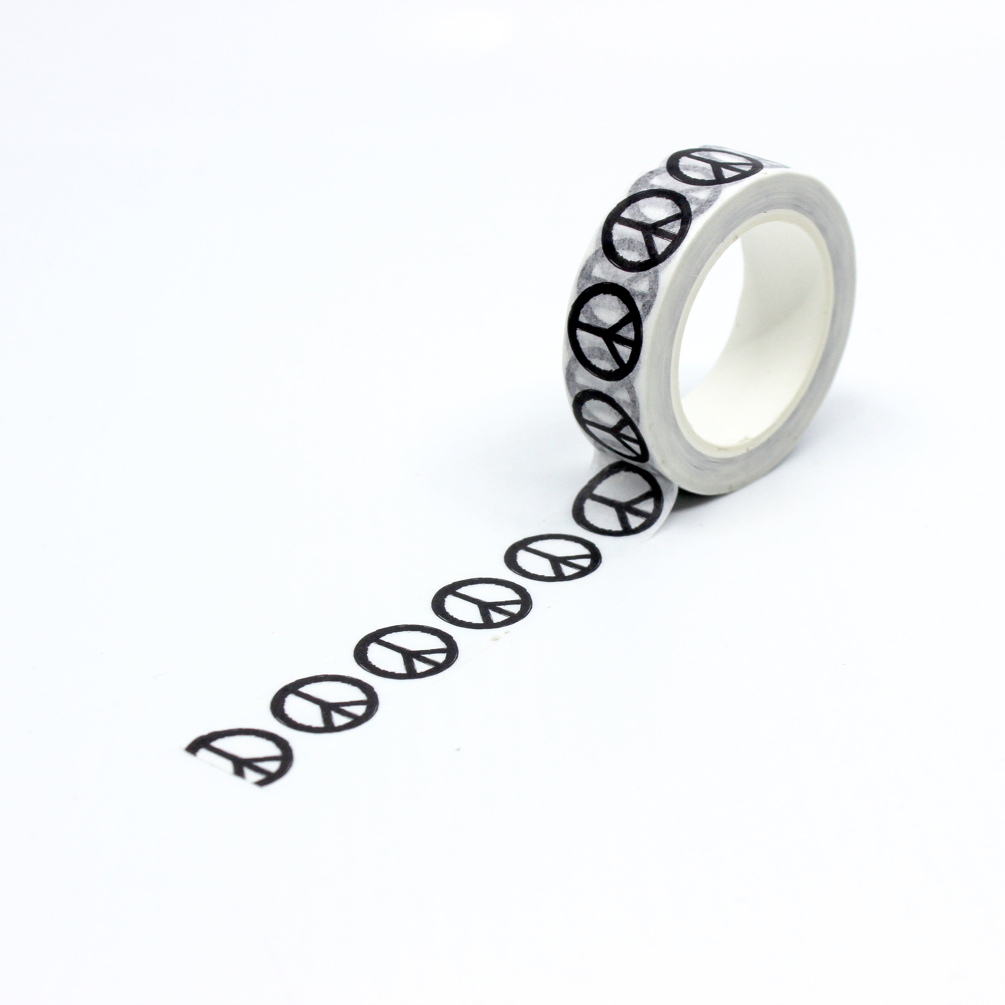 This is a full pattern repeat view of black and white peace signs washi tape BBB Supplies Craft Shop