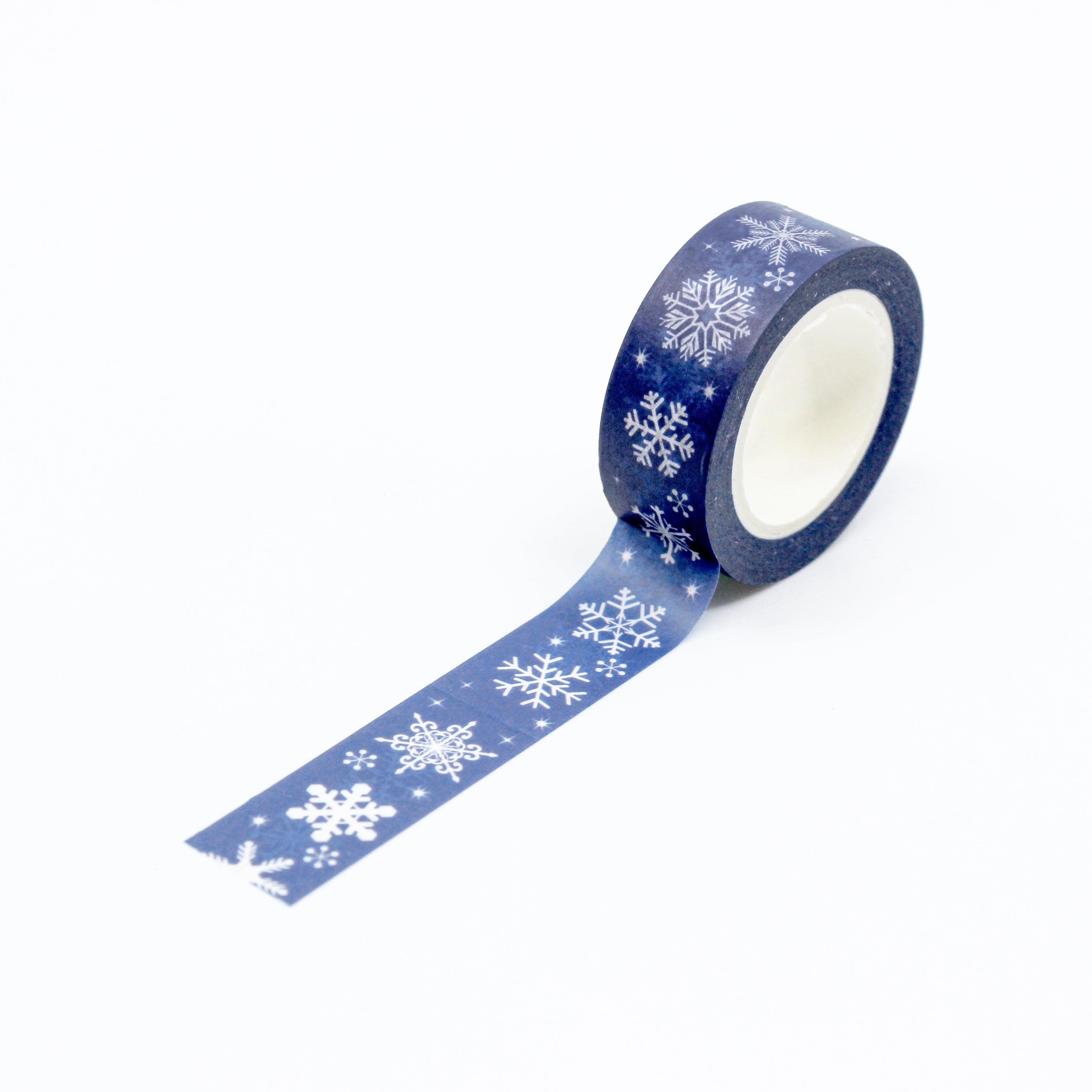 This is a full pattern repeat view of dark blue snowflakes washi tape from BBB Supplies Craft Shop