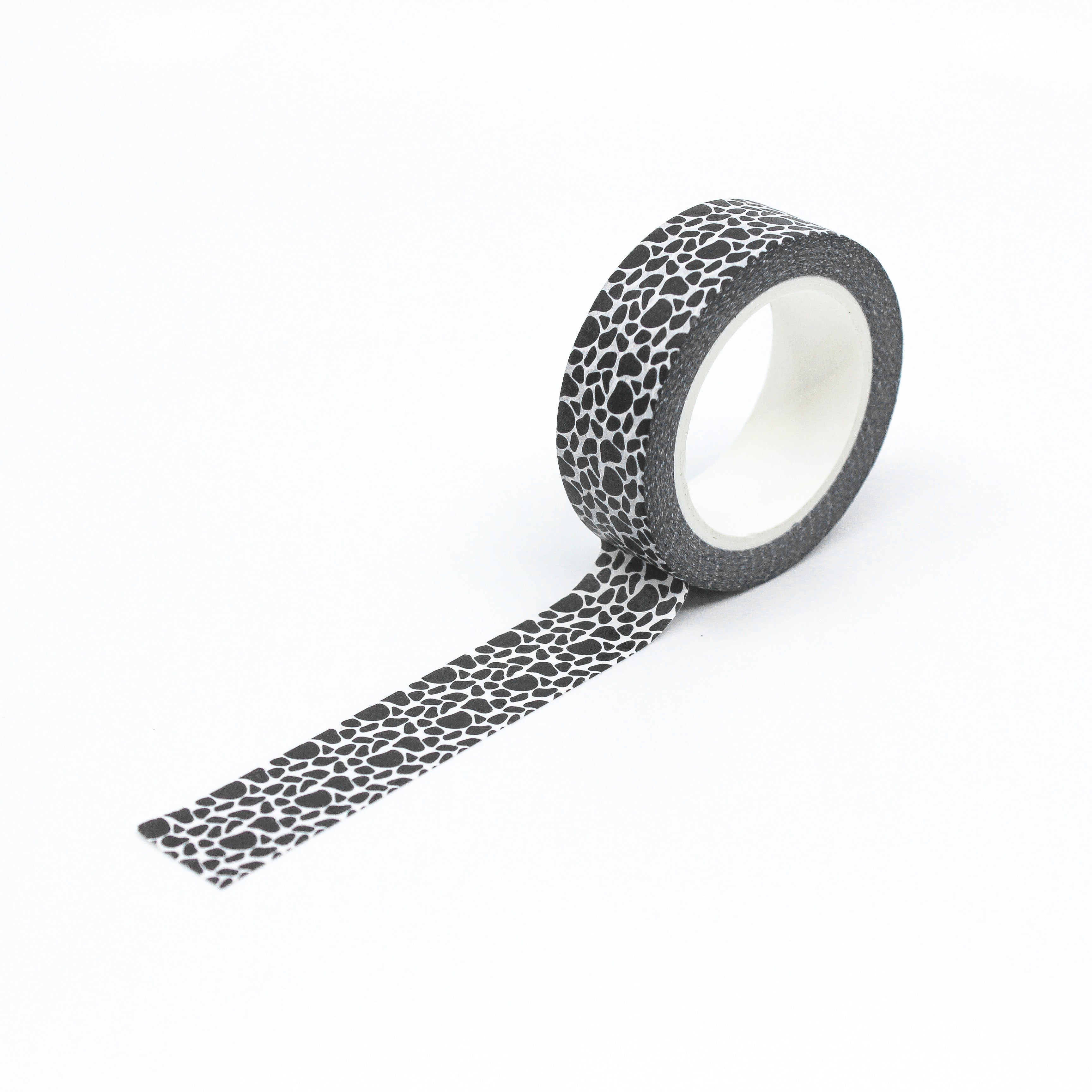 This is a full pattern repeat view of black cow skin style washi tape from BBB Supplies Craft Shop