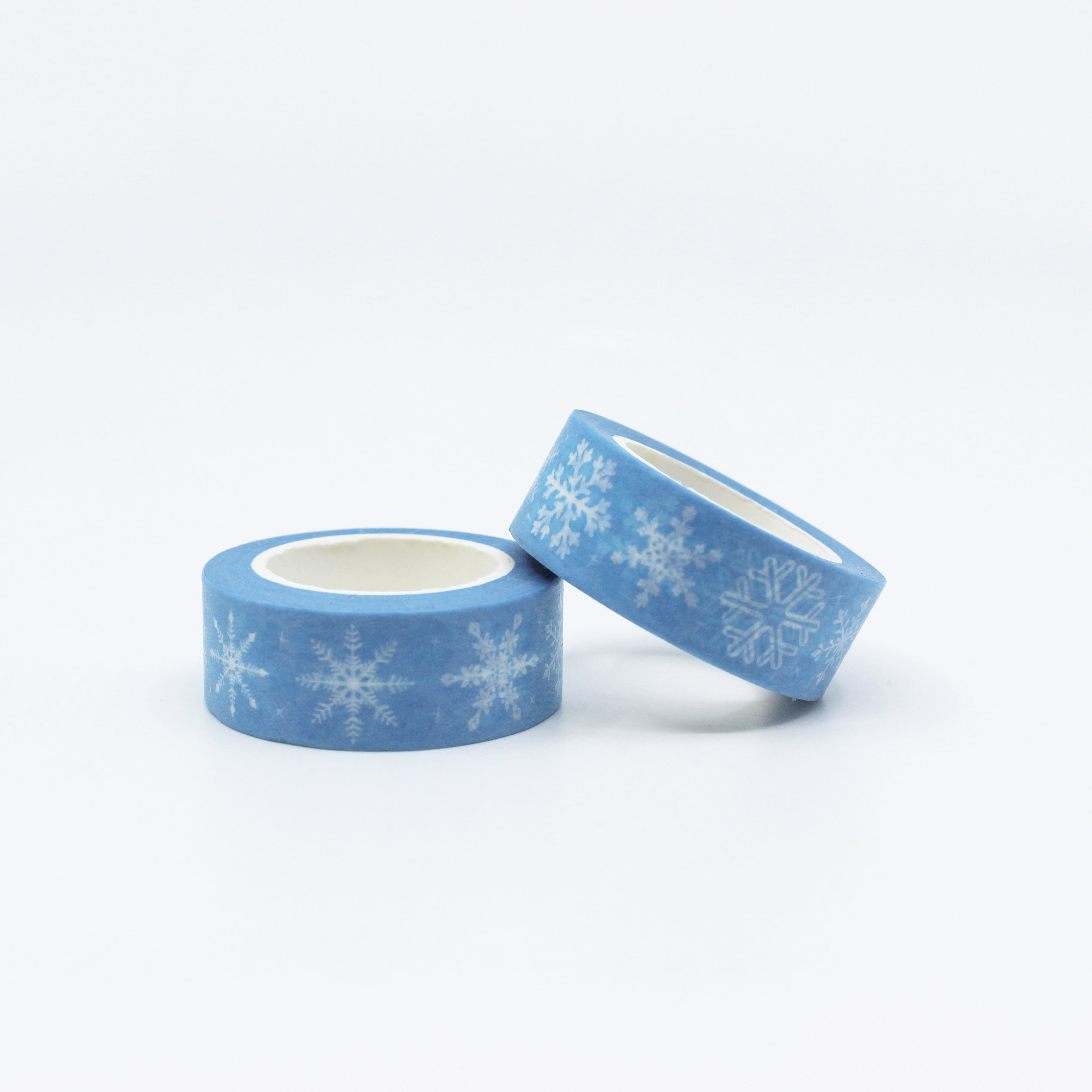 This is a roll of light blue and white snowflakes washi tapes from BBB Supplies Craft Shop