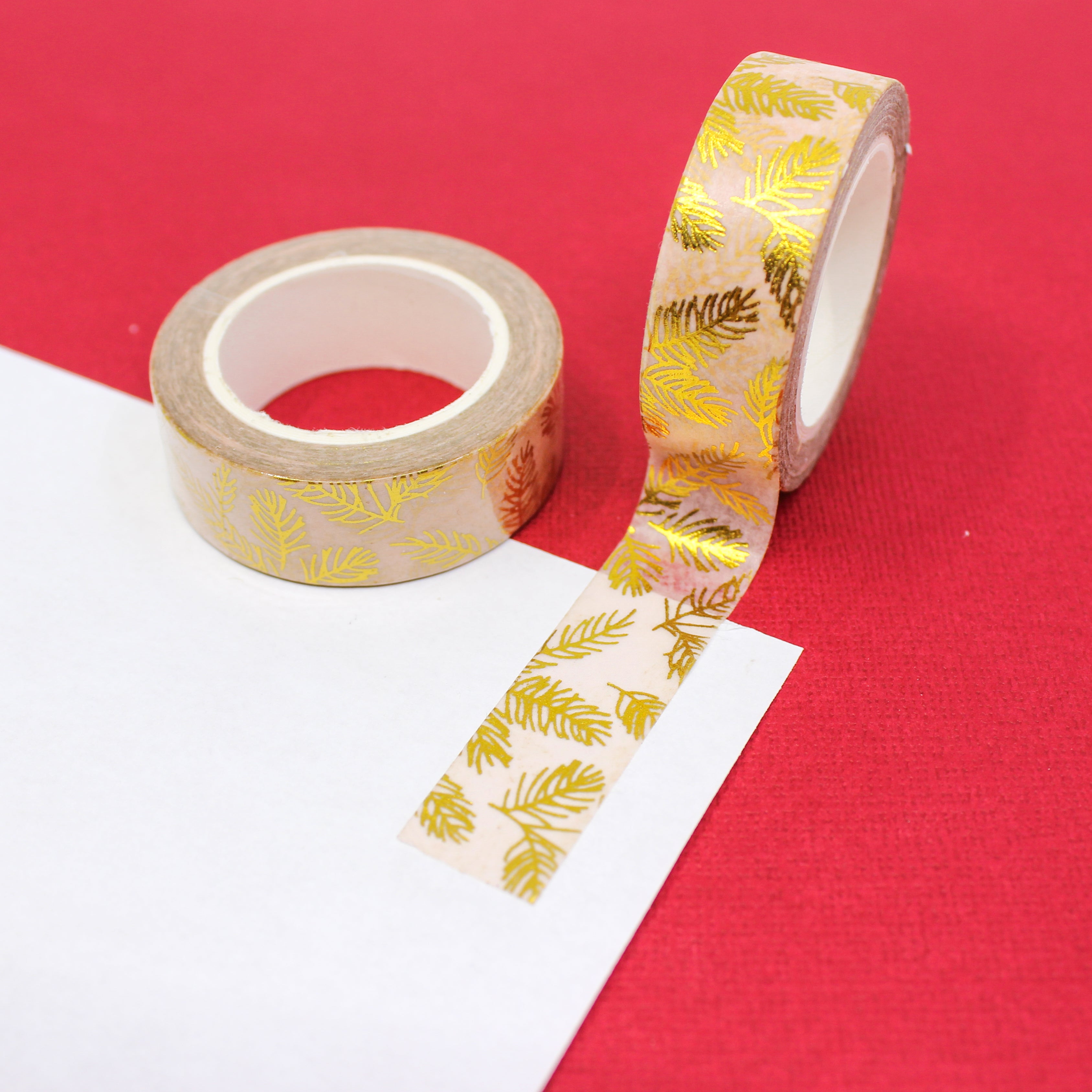 This is a gold foil autumn pine cone leaves washi tape from BBB Supplies Craft Shop