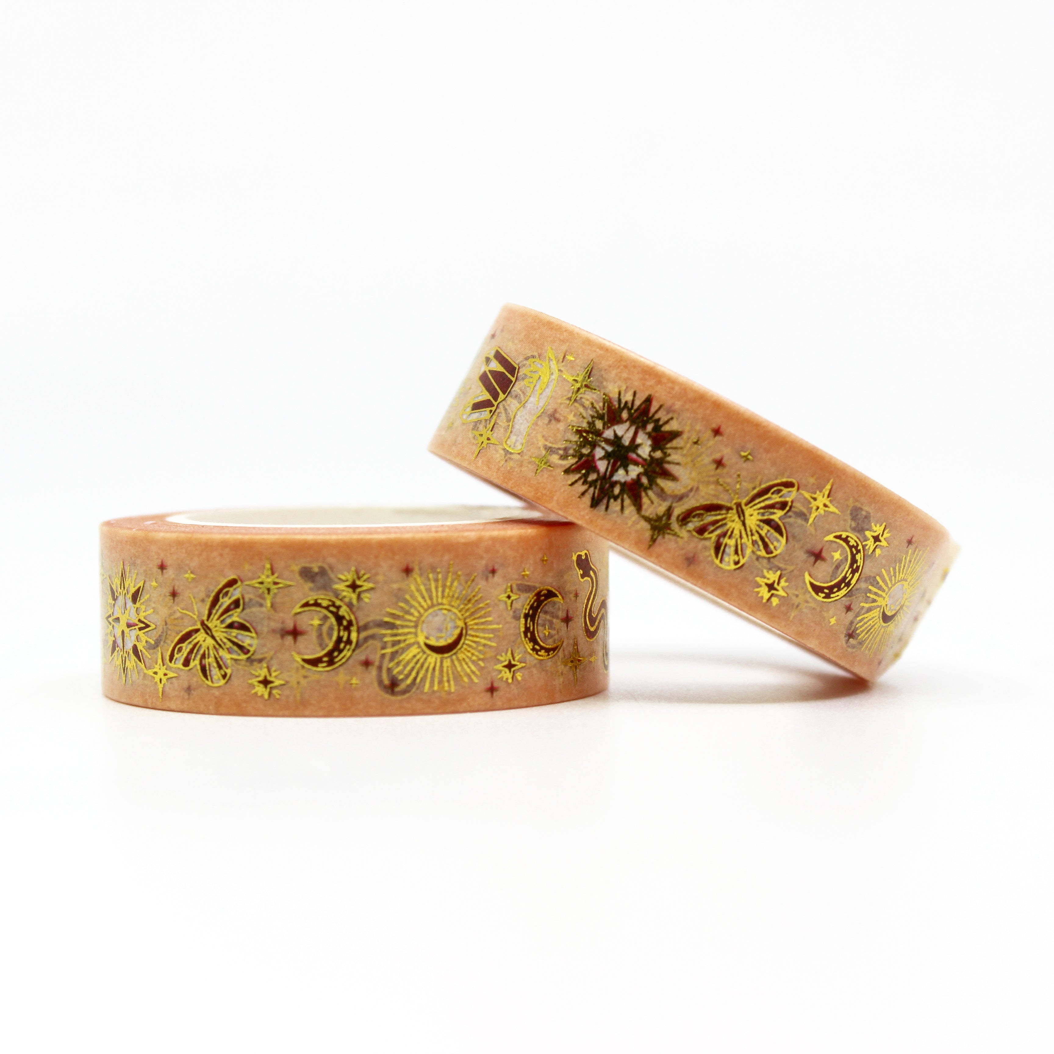 This is an orange spiritual symbols and celestial symbols washi tape from BBB Supplies Craft Shop