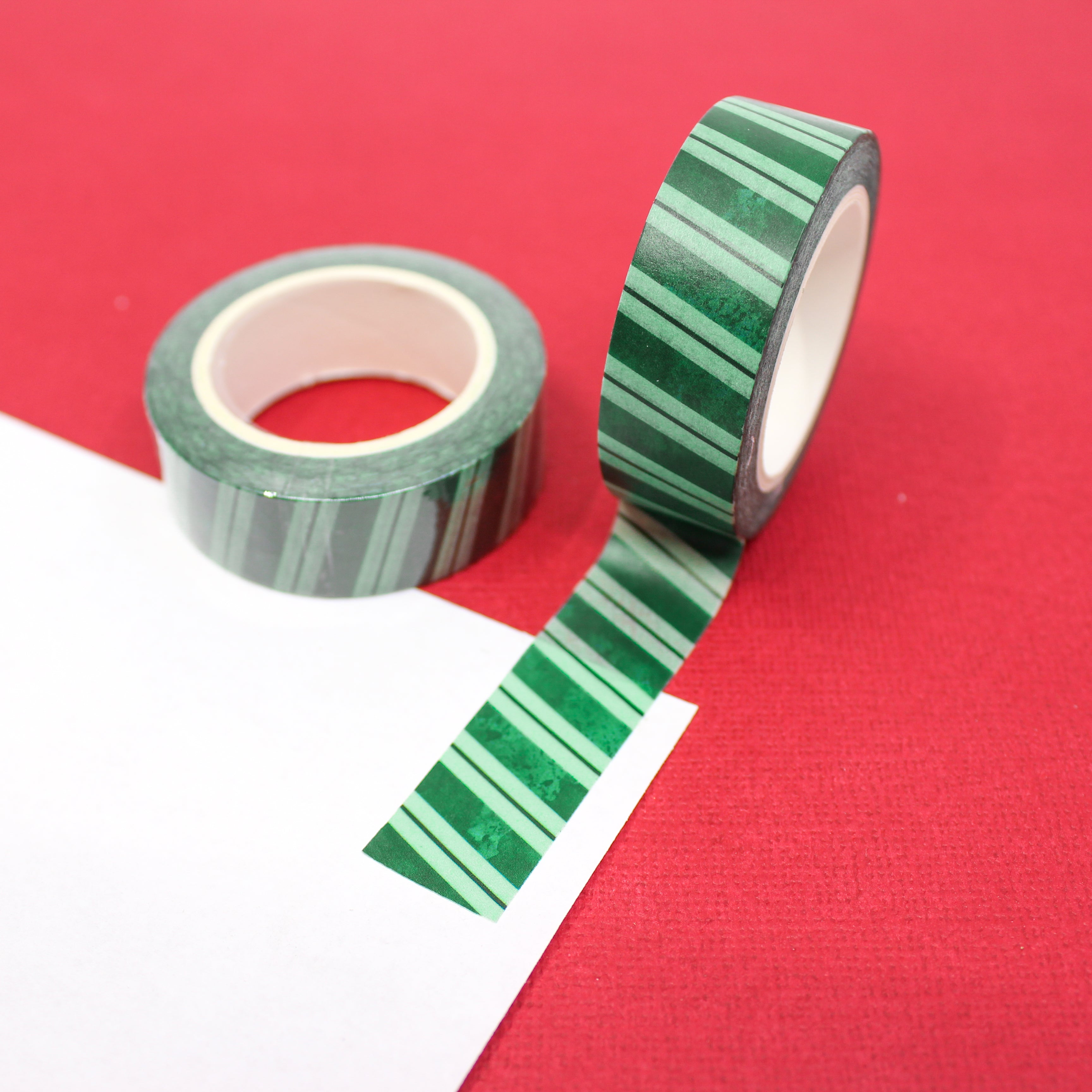 This is a green diagonal striped washi tape from BBB Supplies Craft Shop
