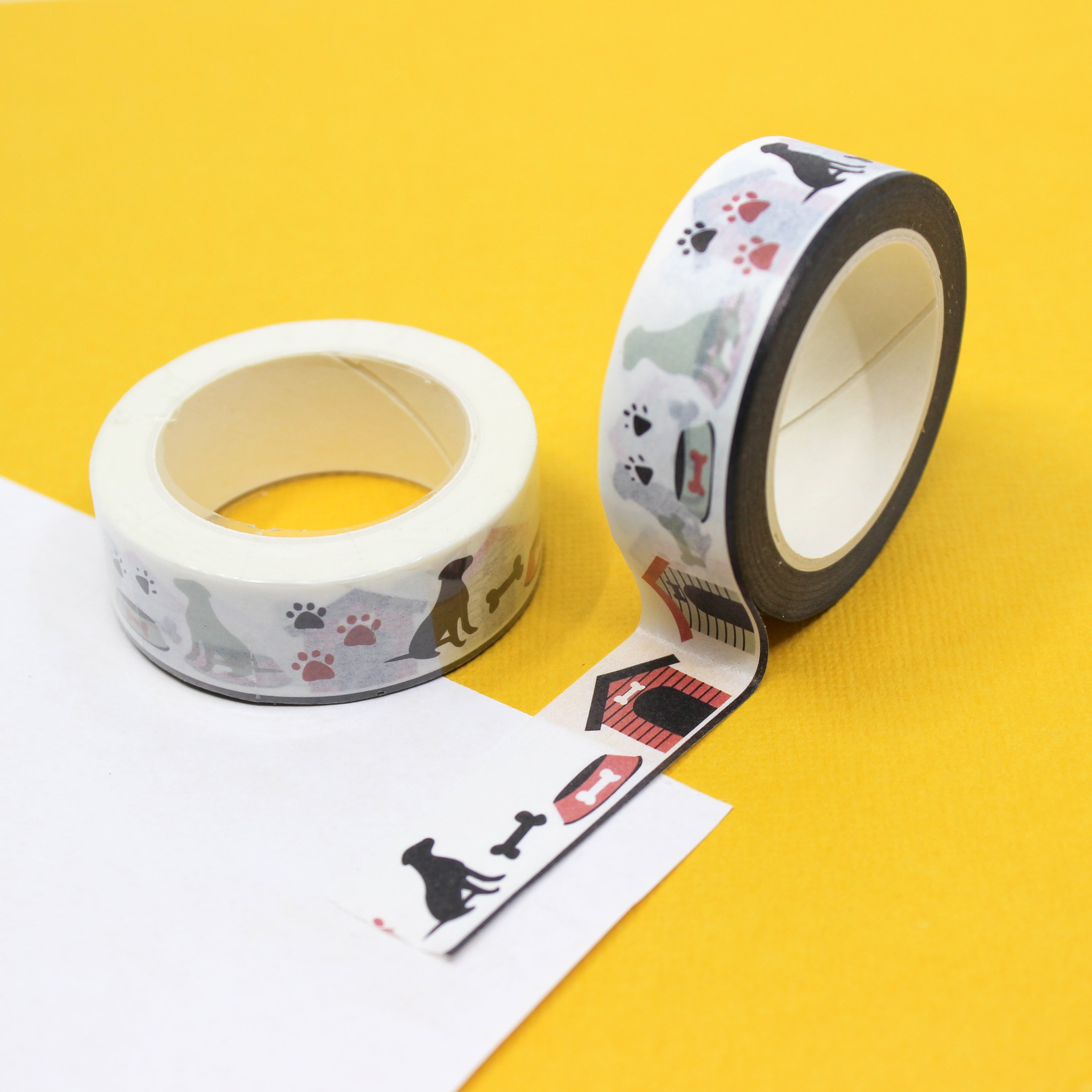 This is a dog house with dogs, bones and paw prints pattern view themed washi tape from BBB Supplies Craft Shop
